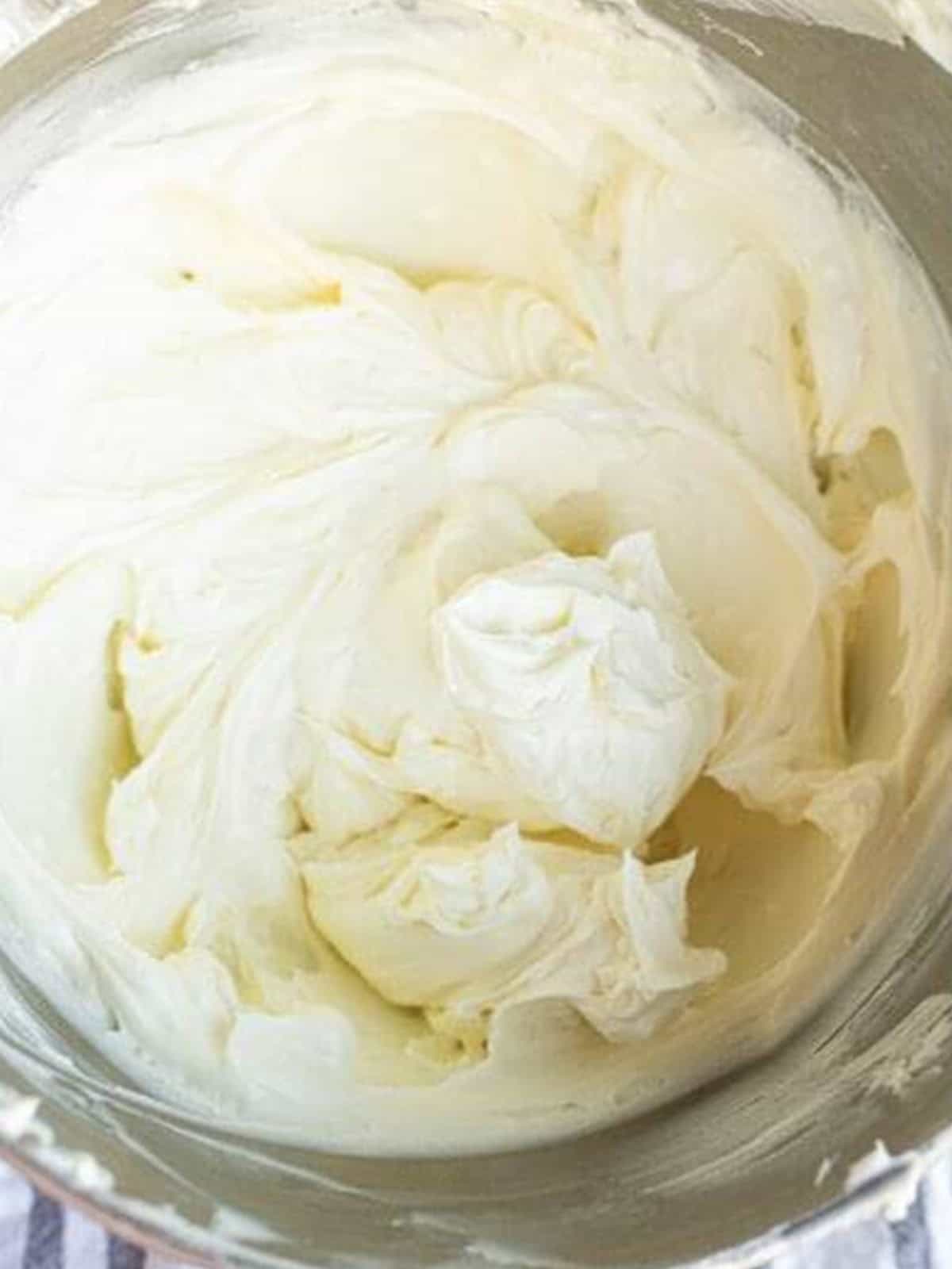 Cream cheese and sugar beaten until smooth for the cheesecake filling.