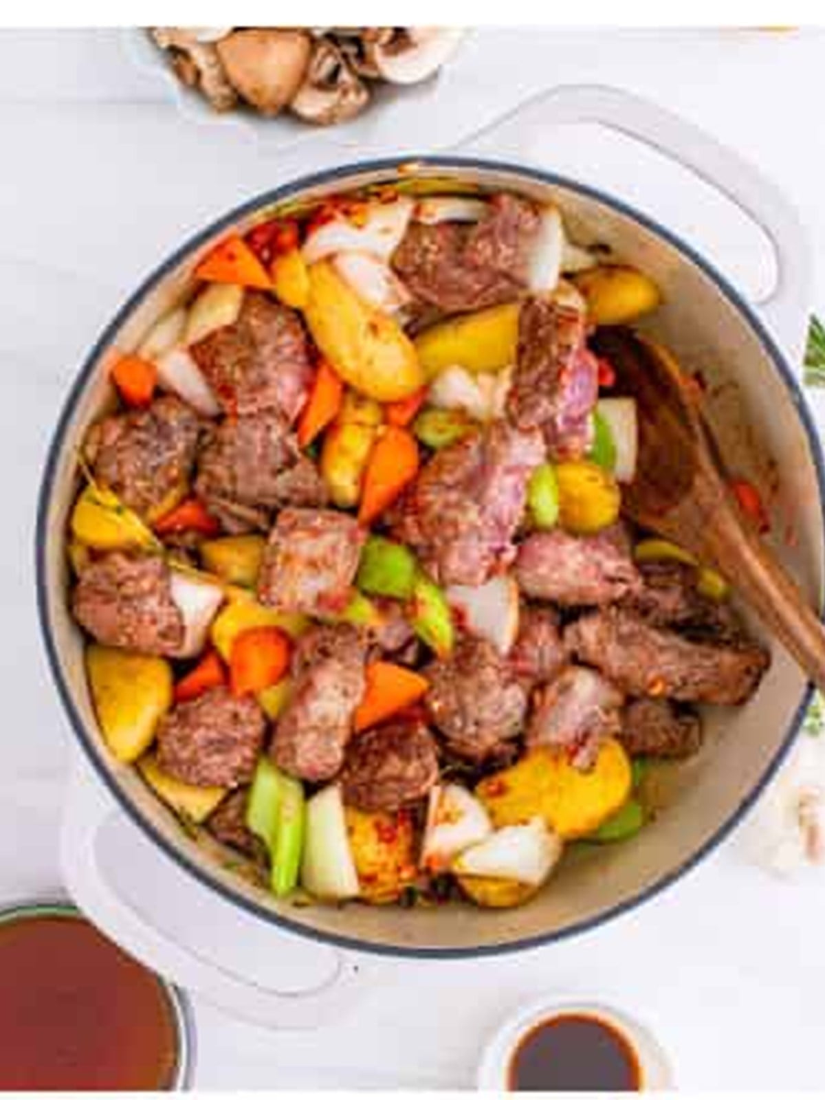 Potatoes, carrots, onion, and celery added to the seared venison.