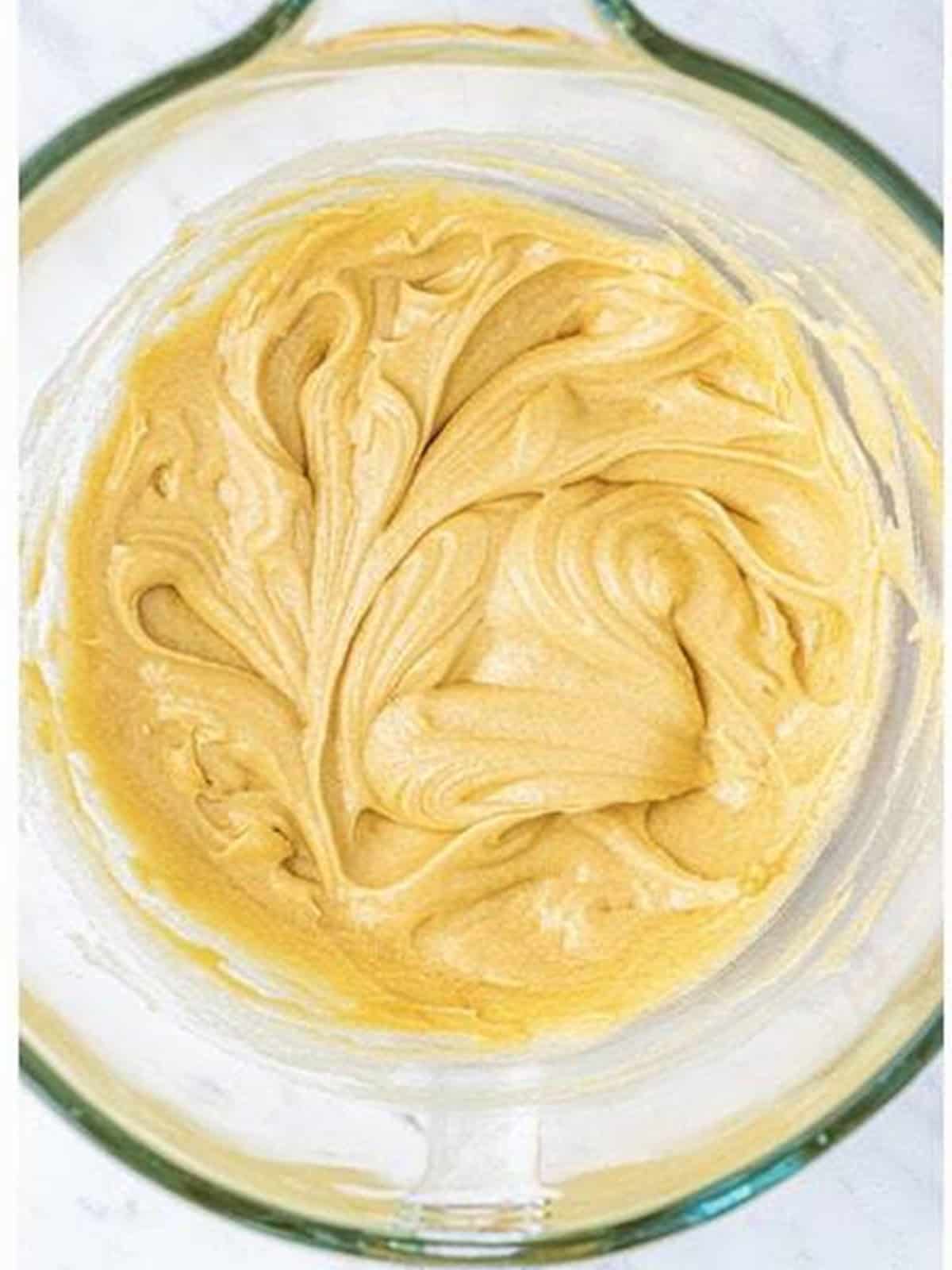 Egg, egg yolk, and vanilla beaten into the cookie batter until smooth.