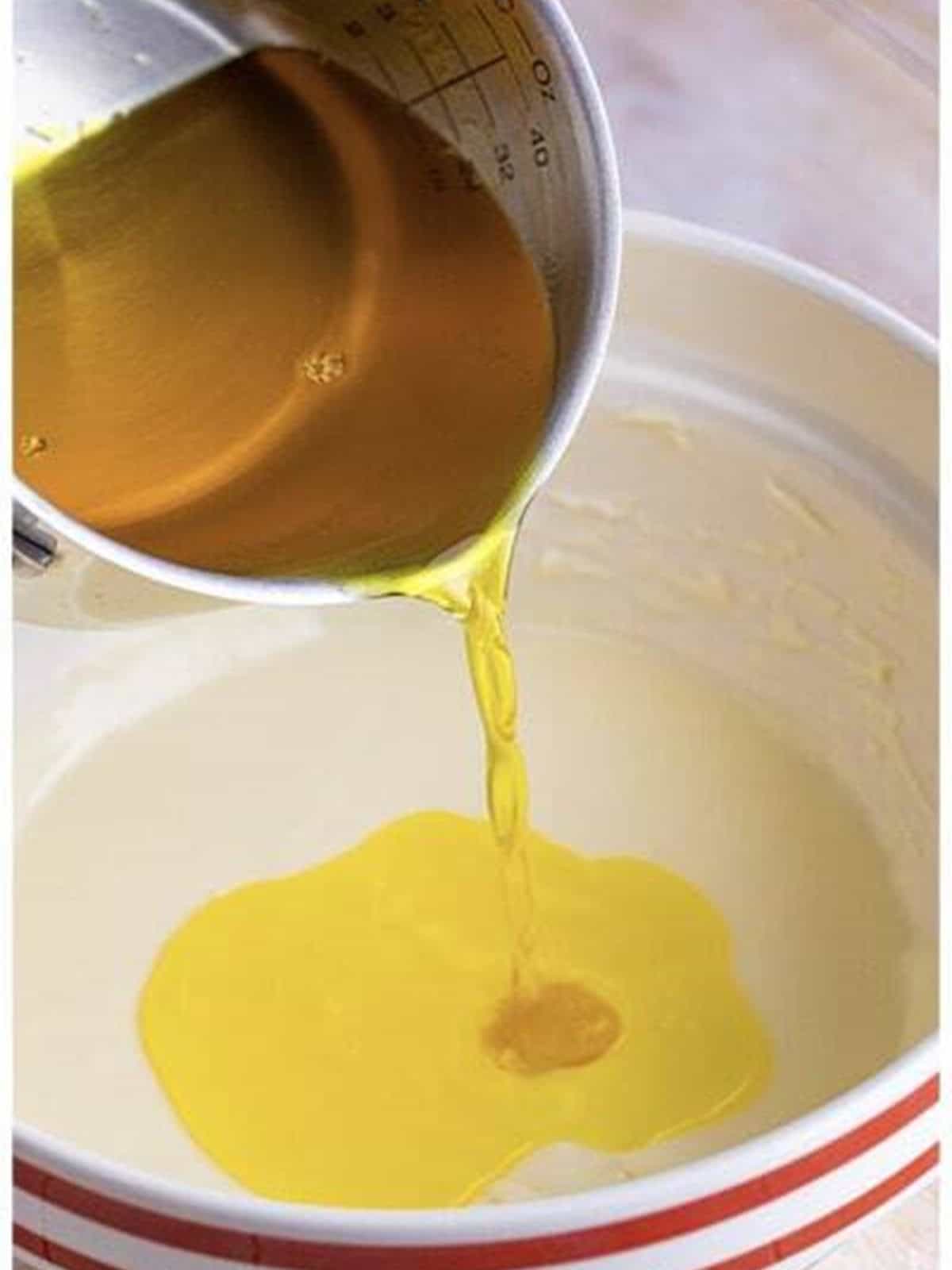 Dissolved lemon jello poured slowly into the cream cheese filling for woolworth cheesecake recipe.