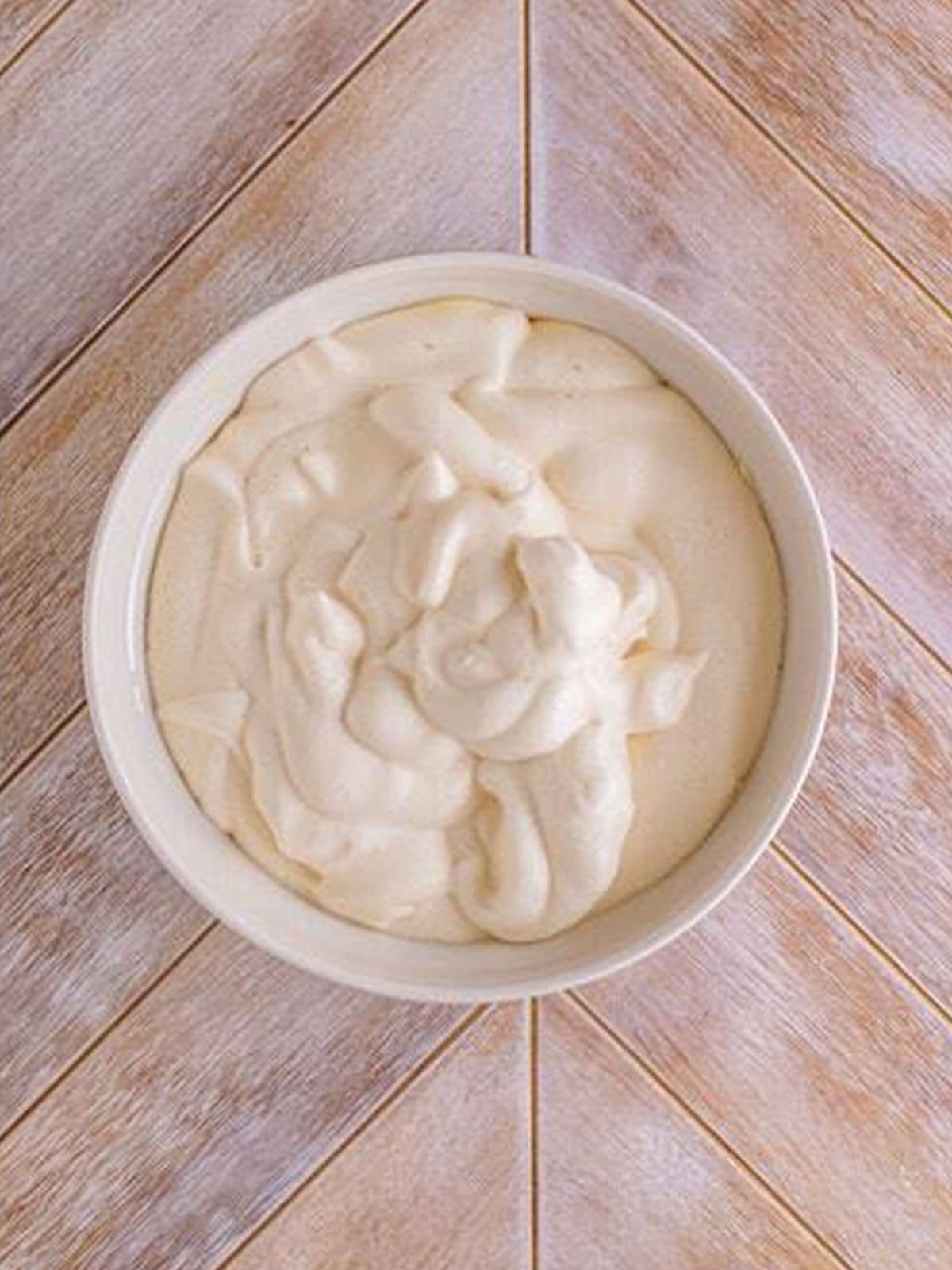 Whipped evaporated milk folded into the lemon cheesecake filling for woolworth cheesecake recipe.