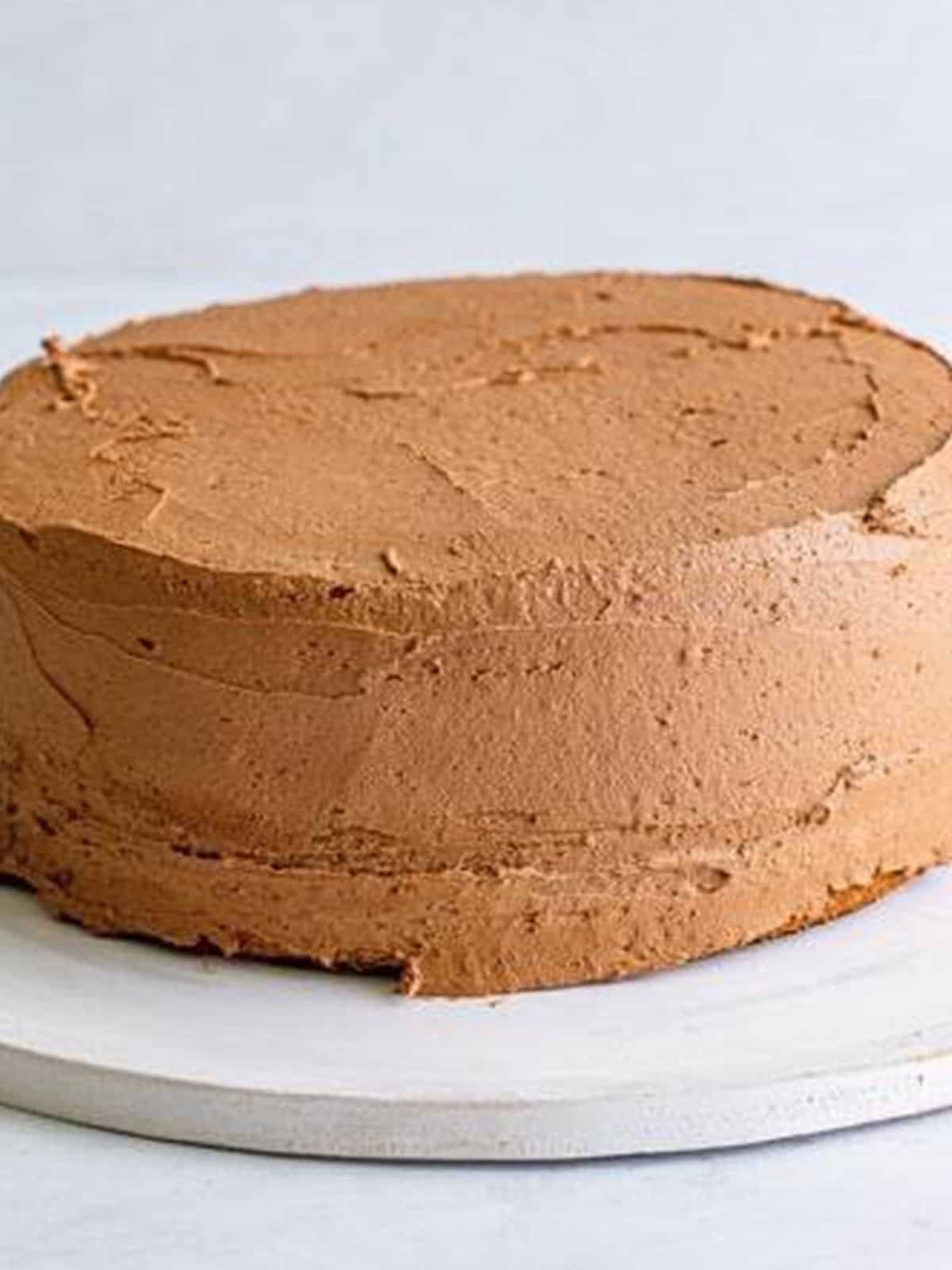 The finished Yellow Cake frosted all over with chocolate frosting.