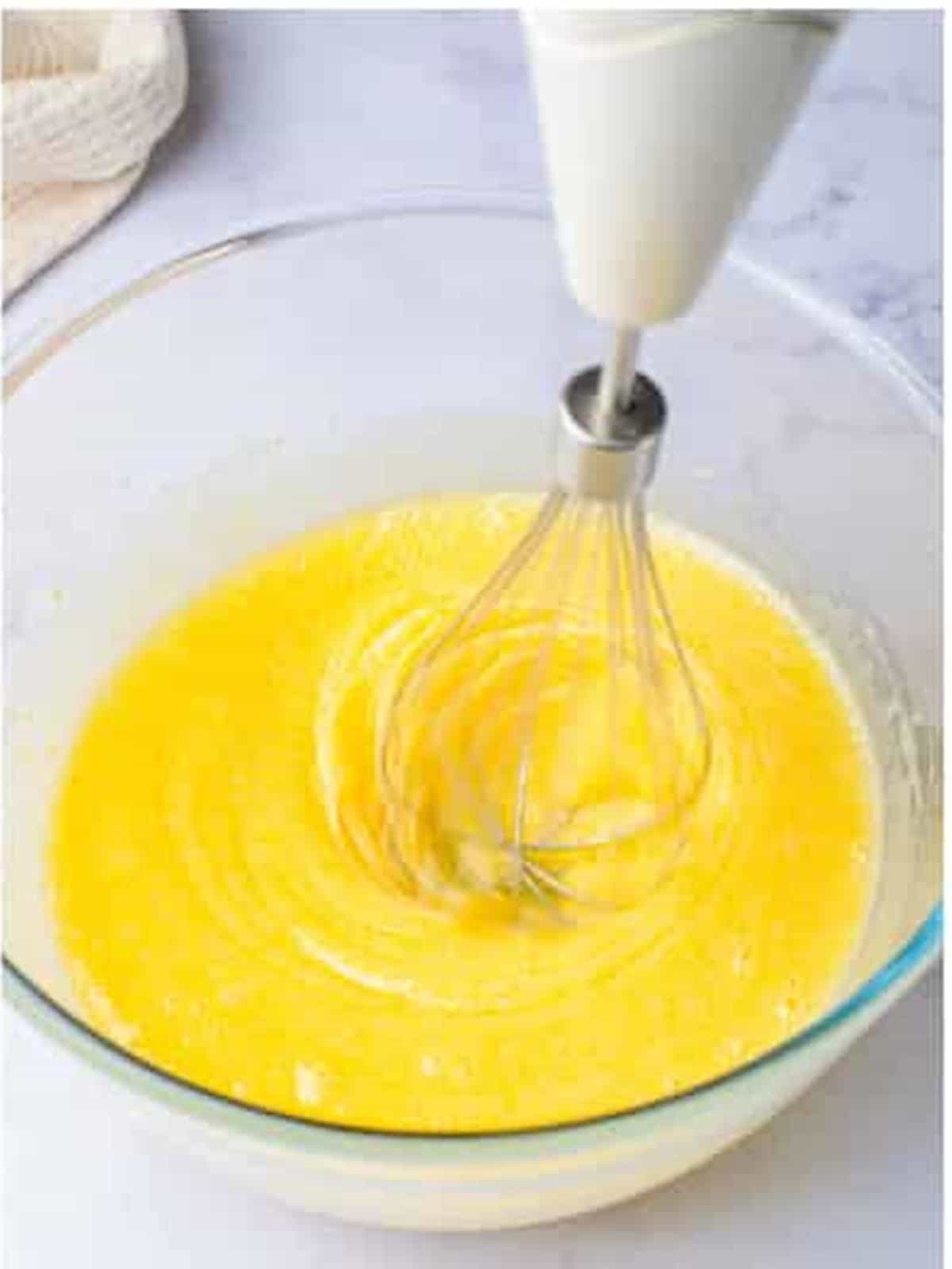 Eggs, oil, sugar, and vanilla whisked into a light fluffy wet mixture.