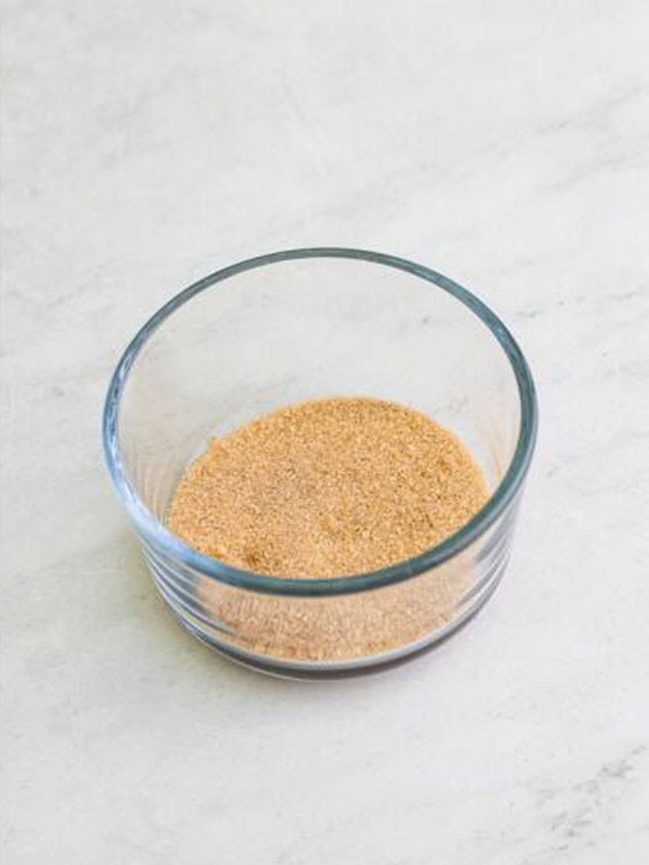 Cinnamon sugar mixture in a small glass bowl.