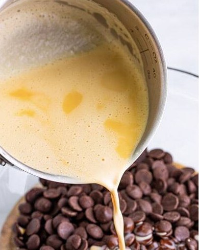 Hot Baileys and heavy cream poured over bittersweet chocolate chips for the ganache frosting.