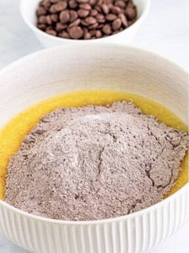 The dry ingredients added to the wet mixture for the baileys cupcake batter.