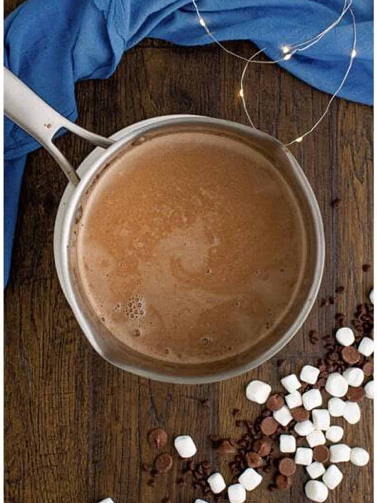 Hot chocolate base whisked smooth in the saucepot as it comes to scalding.