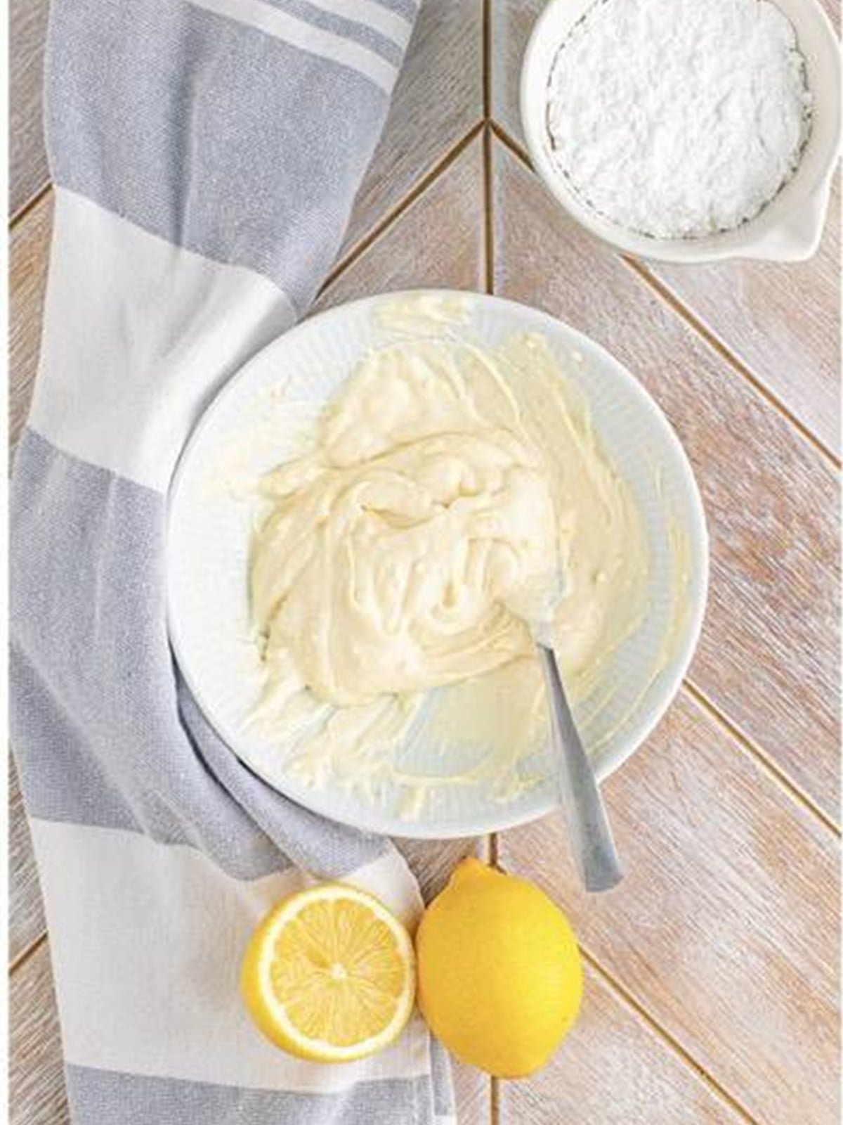 Crescent roll dough separated into triangles on a work surface for Cheesecake Crescent Rolls.