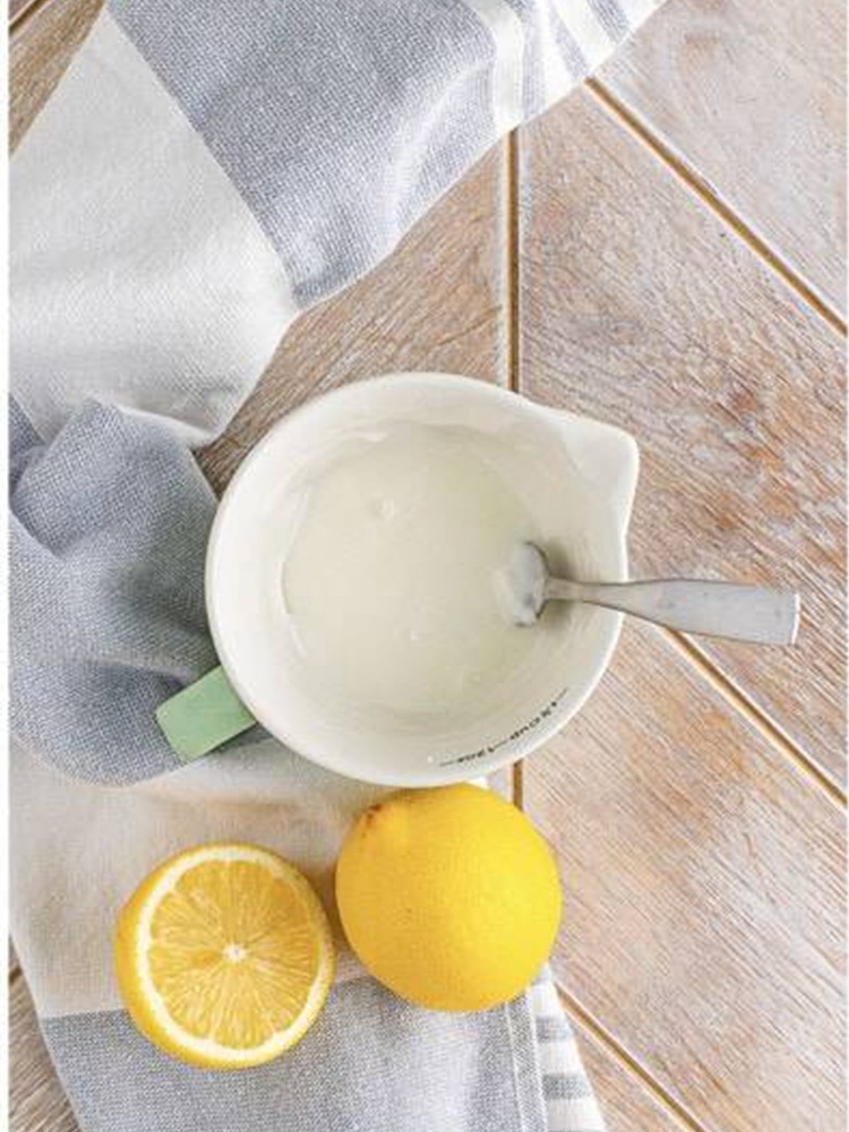 Drizzling lemon glaze over the cooled Cheesecake Crescent Rolls.