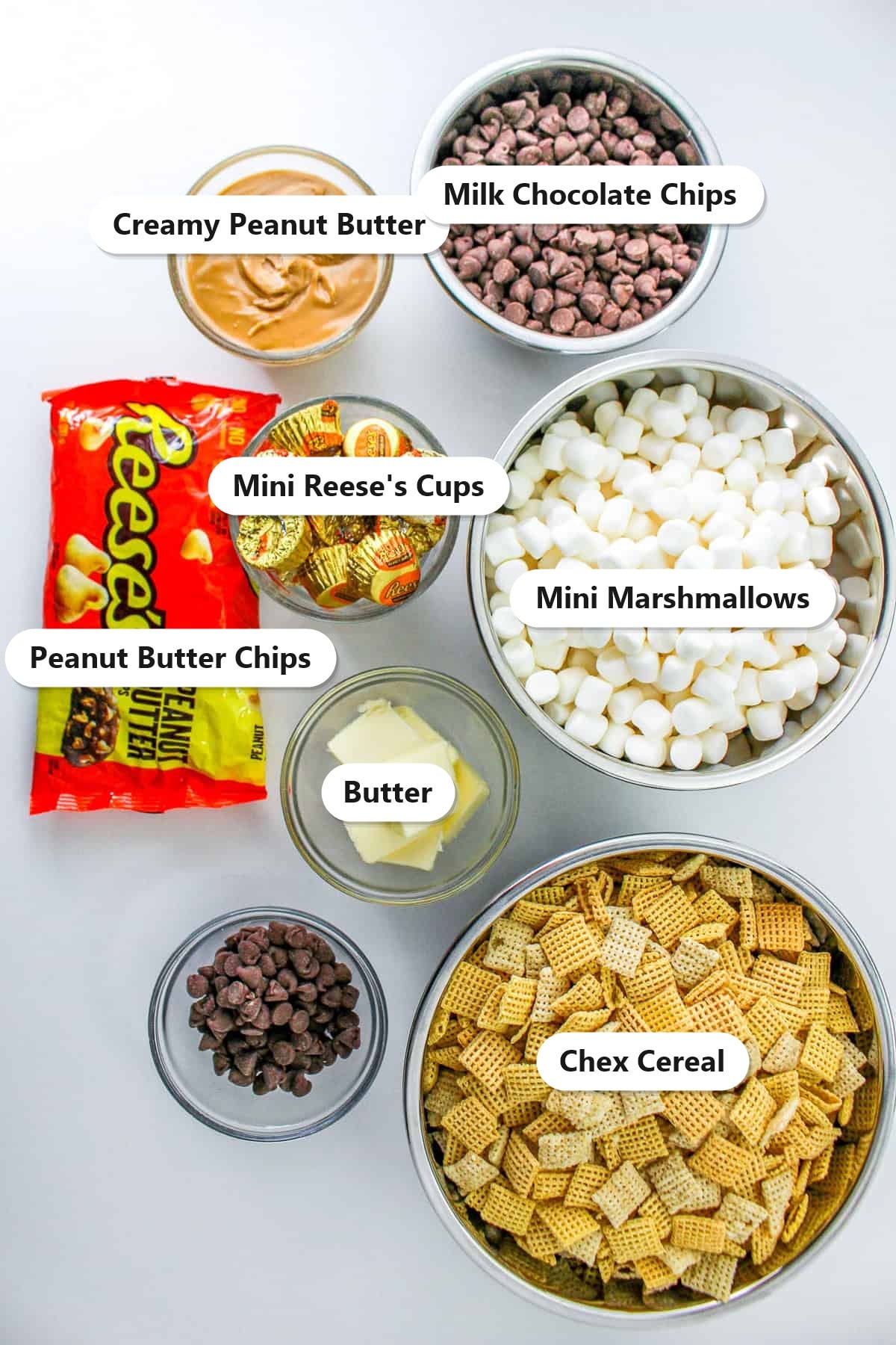 Labeled ingredients for chex bars including Chex cereal, peanut butter chips, milk chocolate chips, mini marshmallows, butter, creamy peanut butter, and mini Reese's cups.