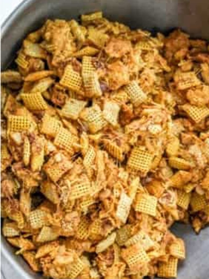 The Chex cereal mixture tossed with the peanut butter marshmallow coating for chex bars.
