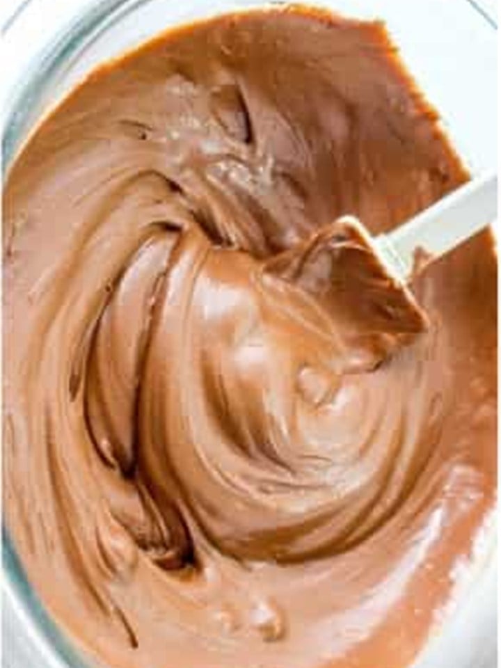 Peanut butter chips and chocolate chips melted smooth for the chex bars topping.