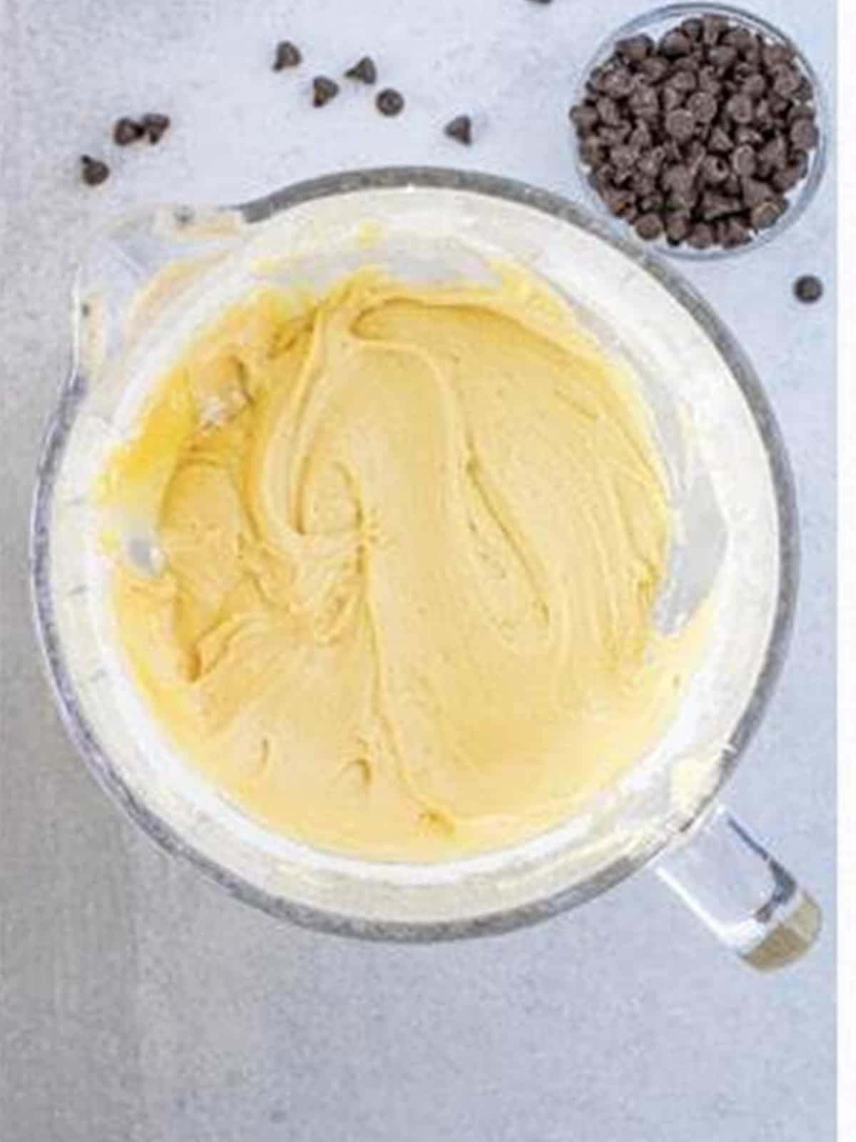 Smooth and fluffy Chocolate Chip Coffee Cake batter in a mixing bowl.