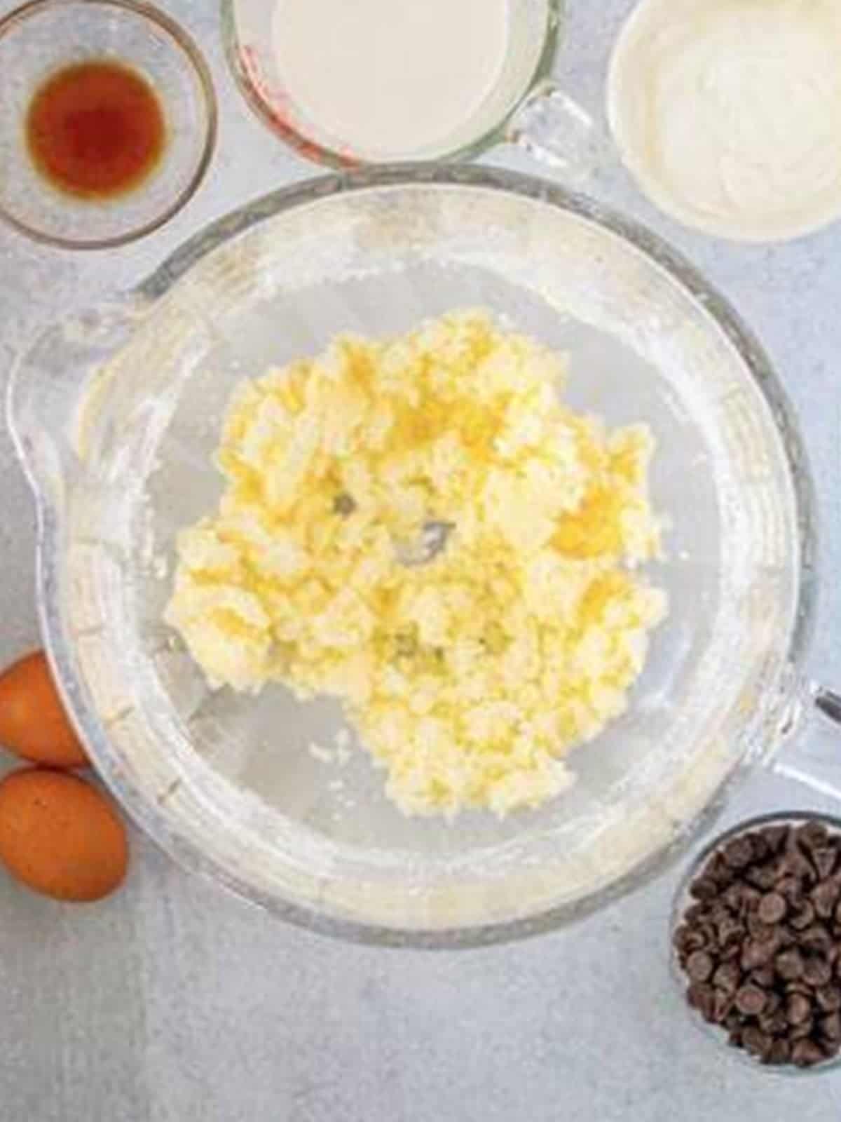 Butter and sugar creamed together in a mixing bowl for Chocolate Chip Coffee Cake.
