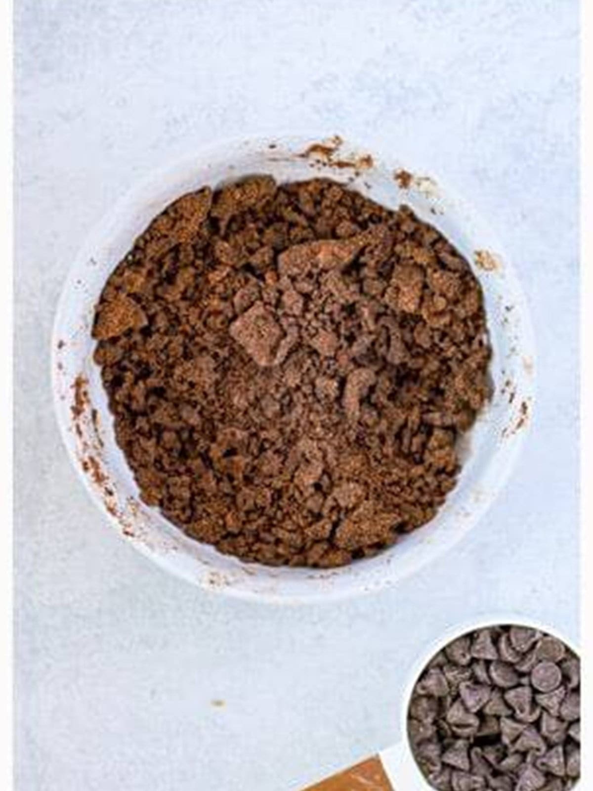 Chocolate crumble topping mixed with a fork until crumbly for Chocolate Chip Coffee Cake.