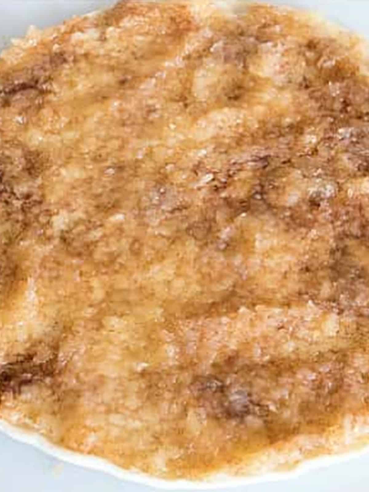 Apple pie filling spread over a pie crust for cinnamon apple twists.