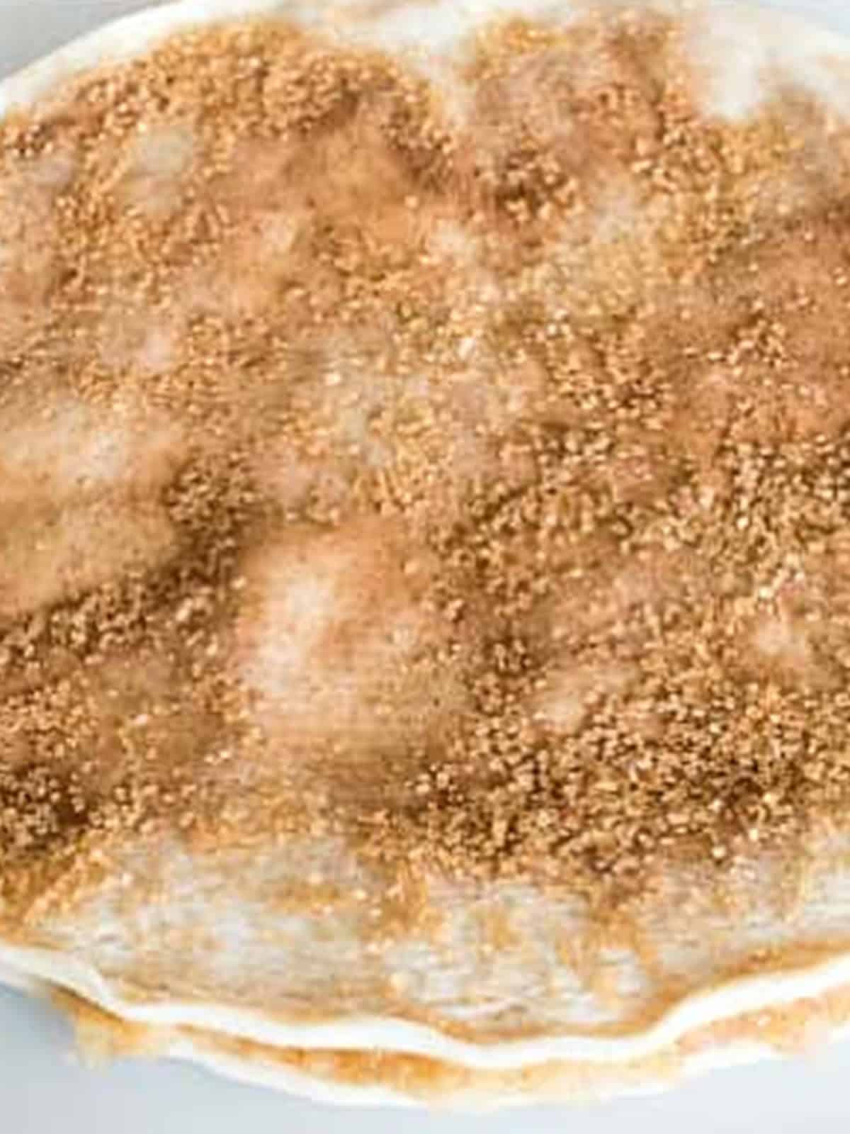 A second pie crust added on top and sprinkled with cinnamon sugar.