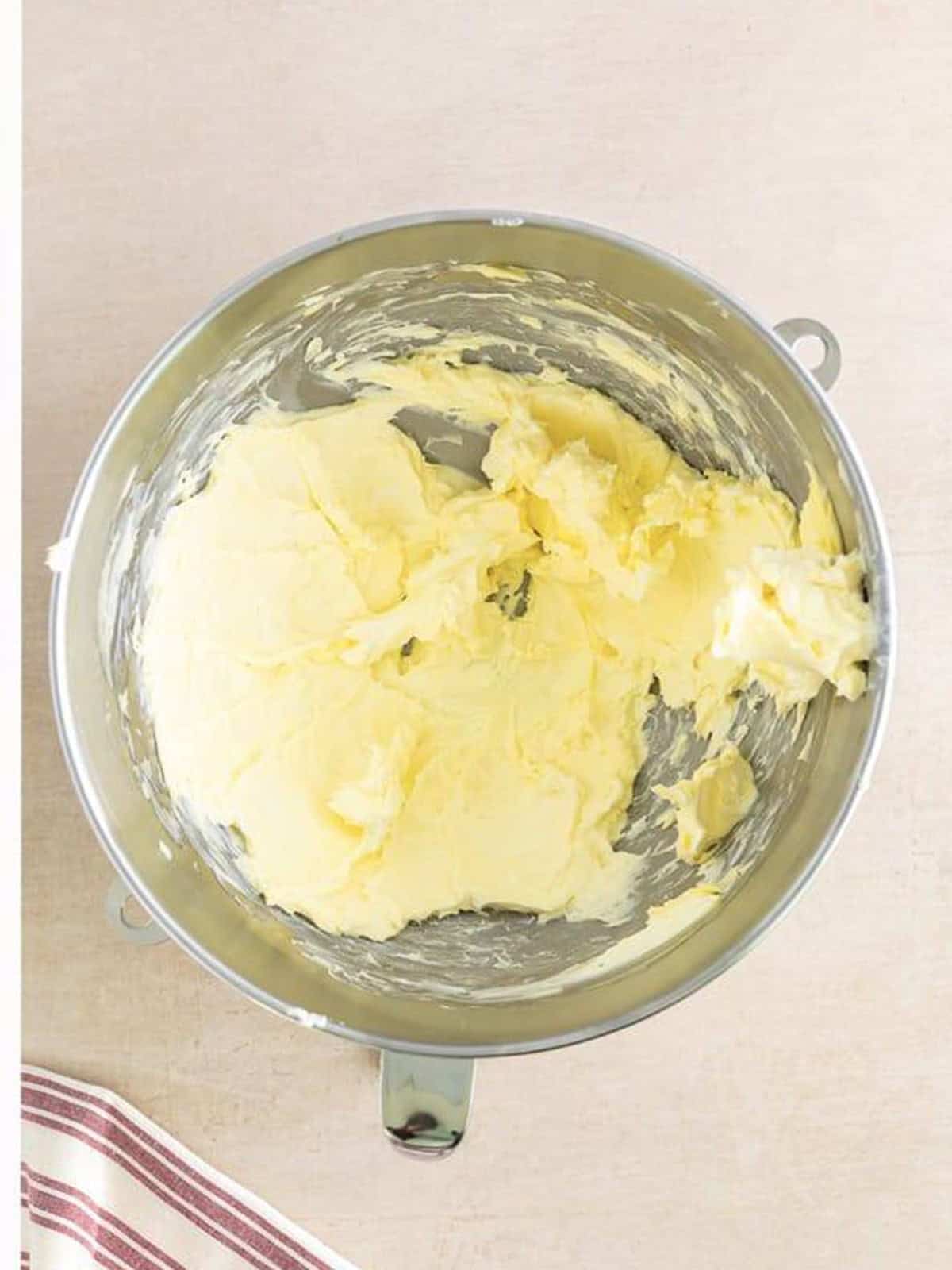 Cream cheese and butter whipped until smooth in the stand mixer bowl.