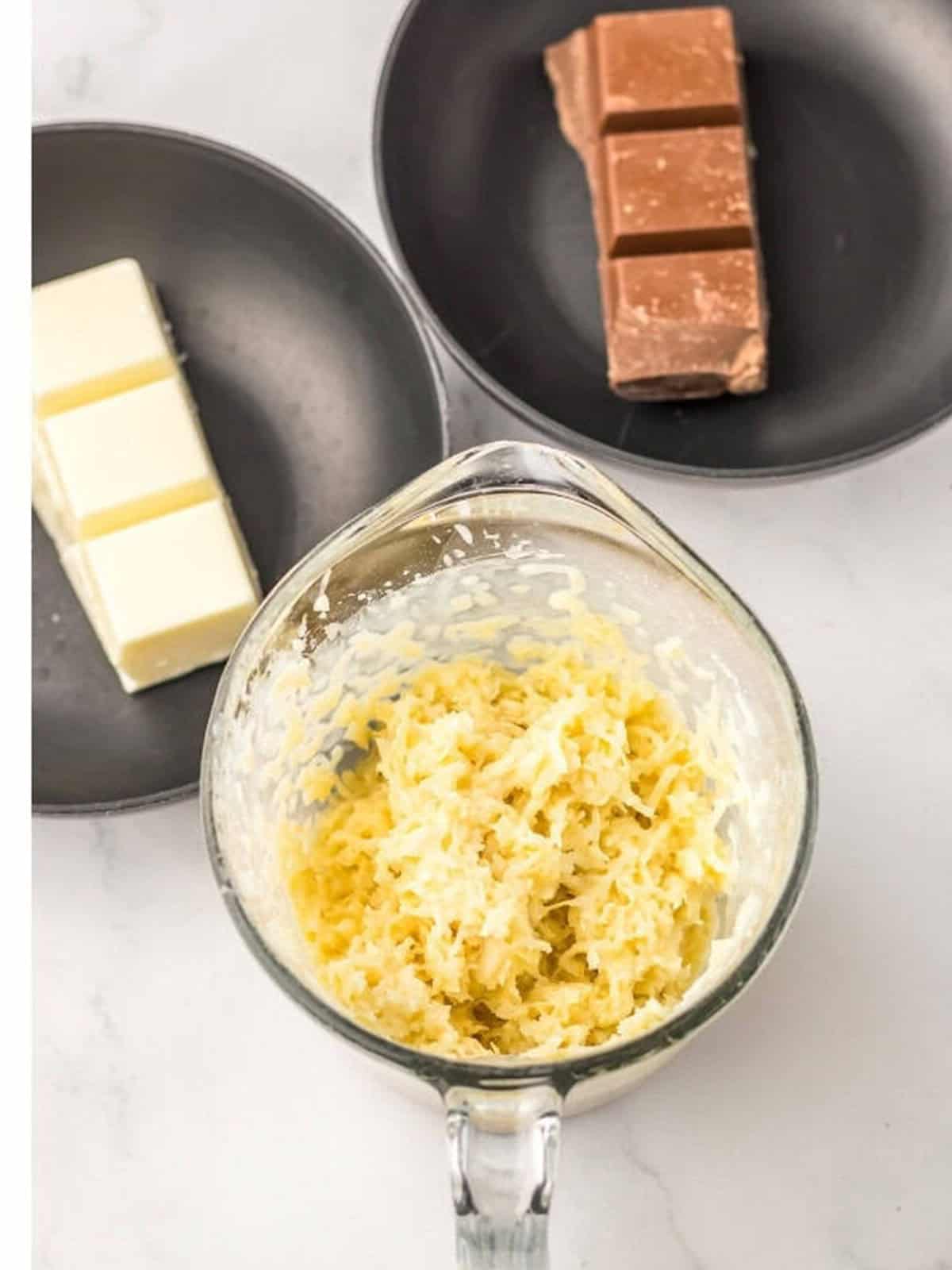 Shredded coconut mixed with sweetened condensed milk and vanilla for the Coconut Candy filling.