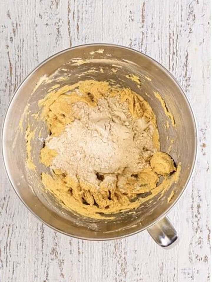 Flour mixture added to the coffee cake cookie dough in the mixer bowl.