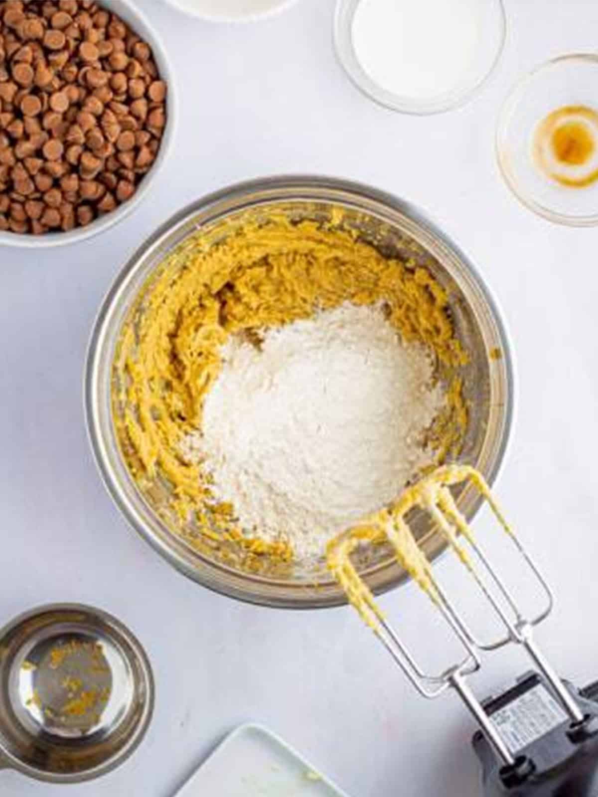 Heat treated flour added to the creamed butter and sugar mixture.