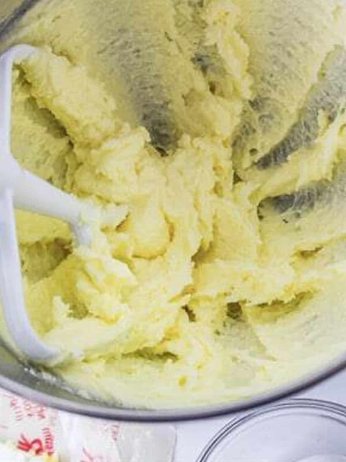 Butter and granulated sugar creamed until fluffy in a stand mixer bowl.