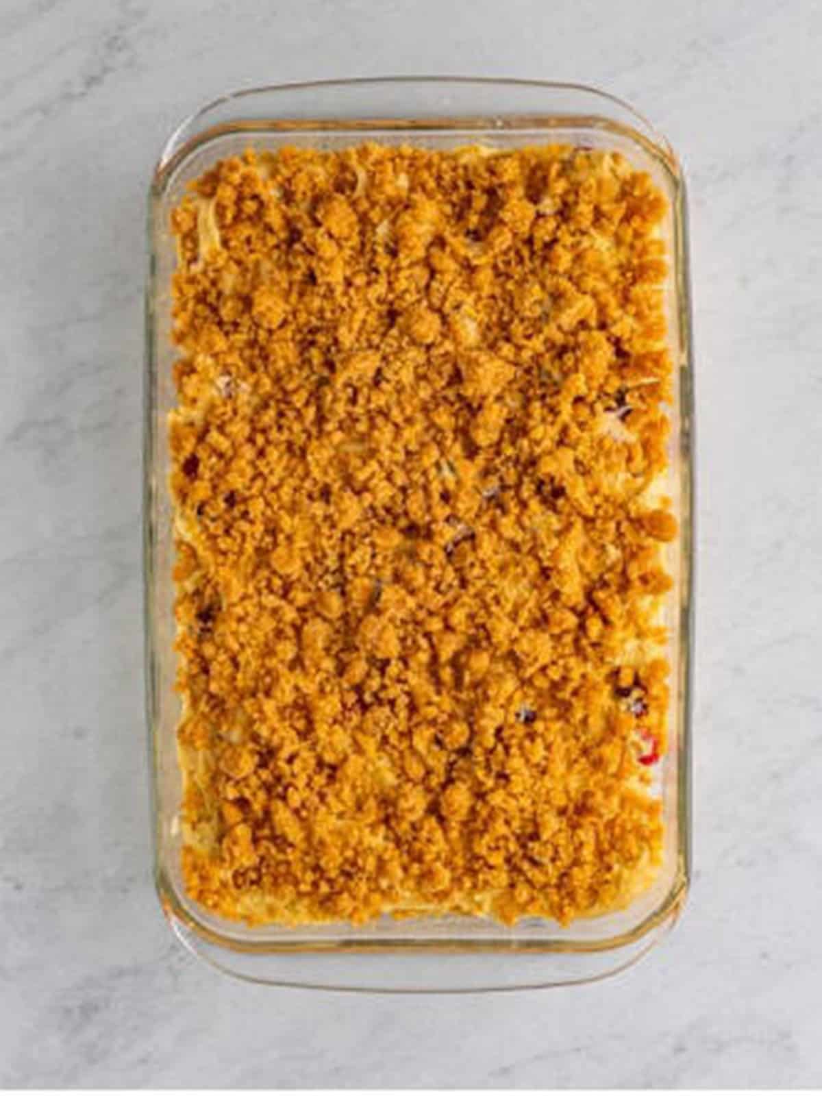 Brown sugar crumb topping sprinkled evenly over the batter.