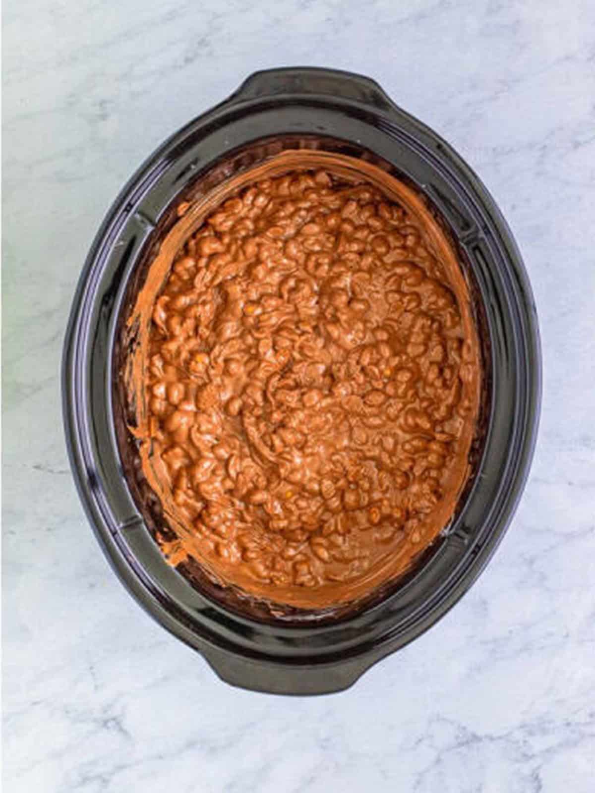 Peanuts stirred into the melted chocolate until fully coated