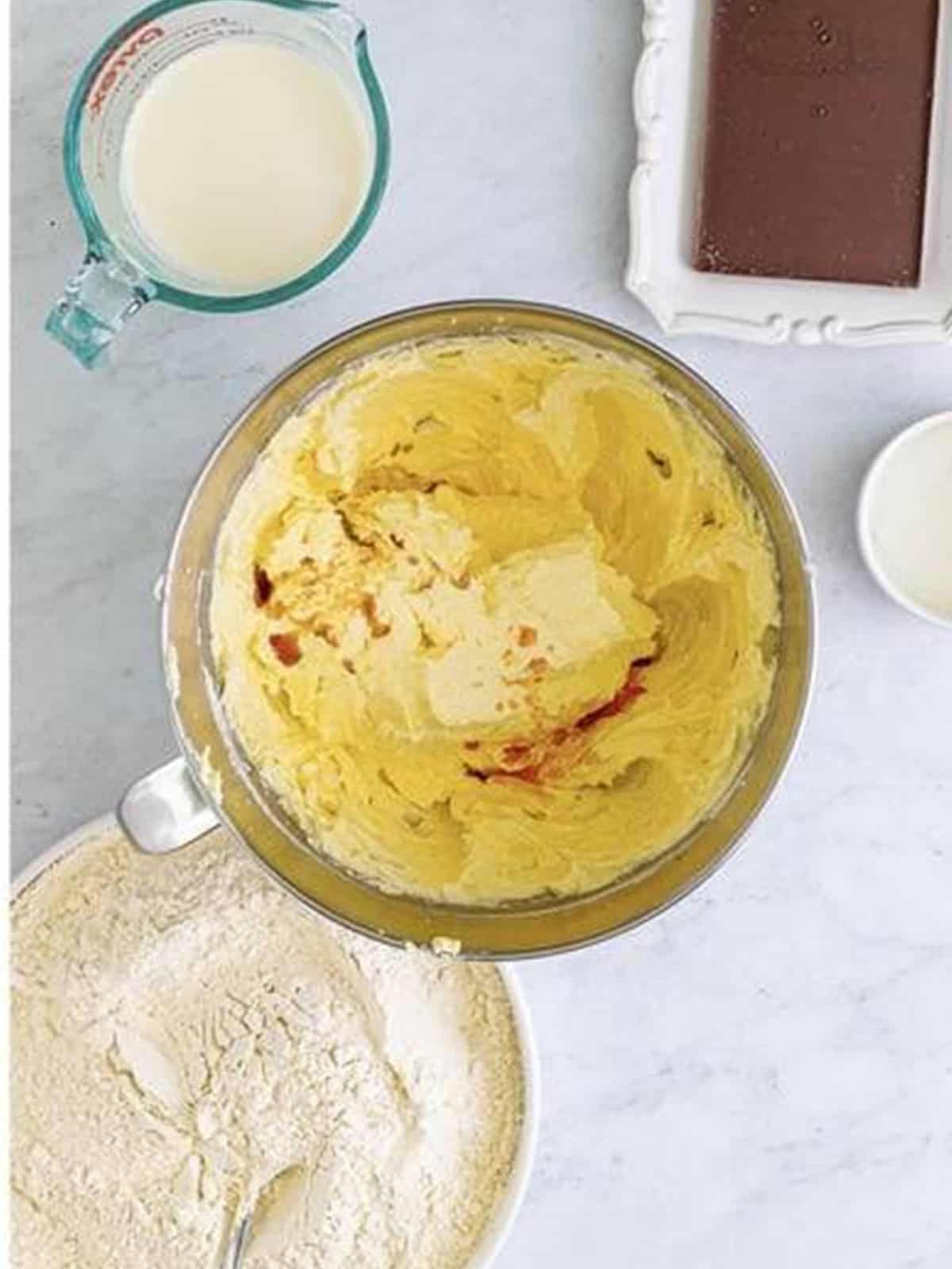 Cake batter, almond, and vanilla extracts mixed into the cookie dough base.