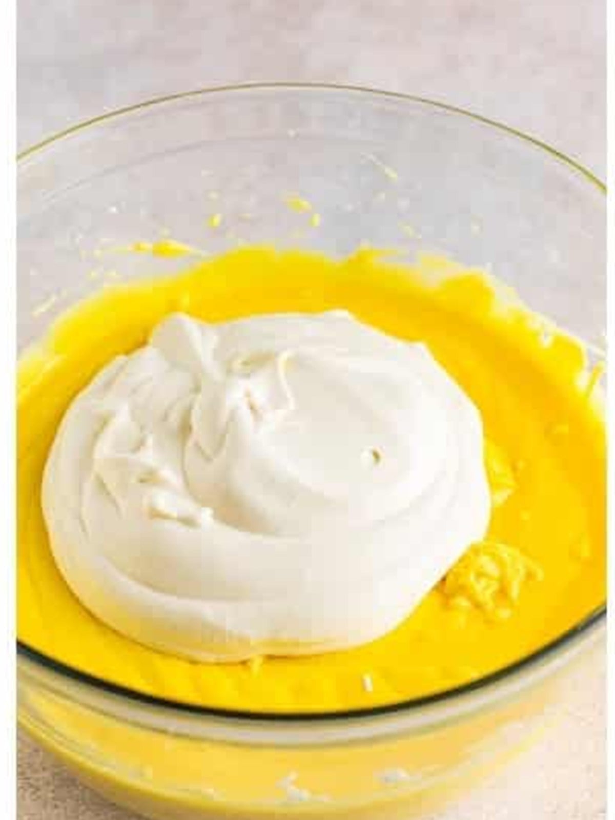 Whipped cream folded into the pudding and cream cheese mixture for dirt cake.