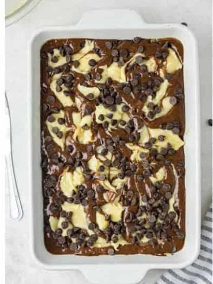 Dollops of cream cheese mixture swirled into the chocolate cake batter with chocolate chips.