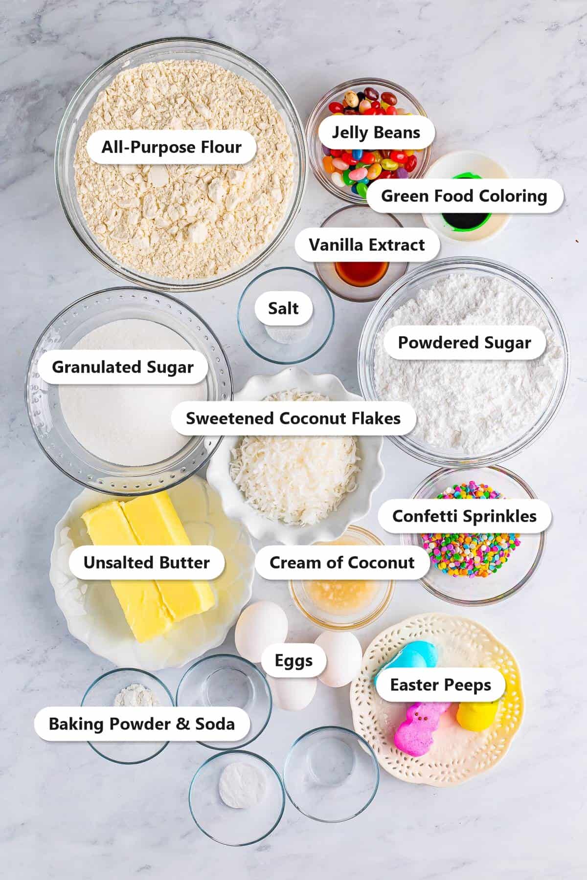 Labeled ingredients for Easter Cookie Bars including flour, butter, coconut flakes, sprinkles, and Easter Peeps.