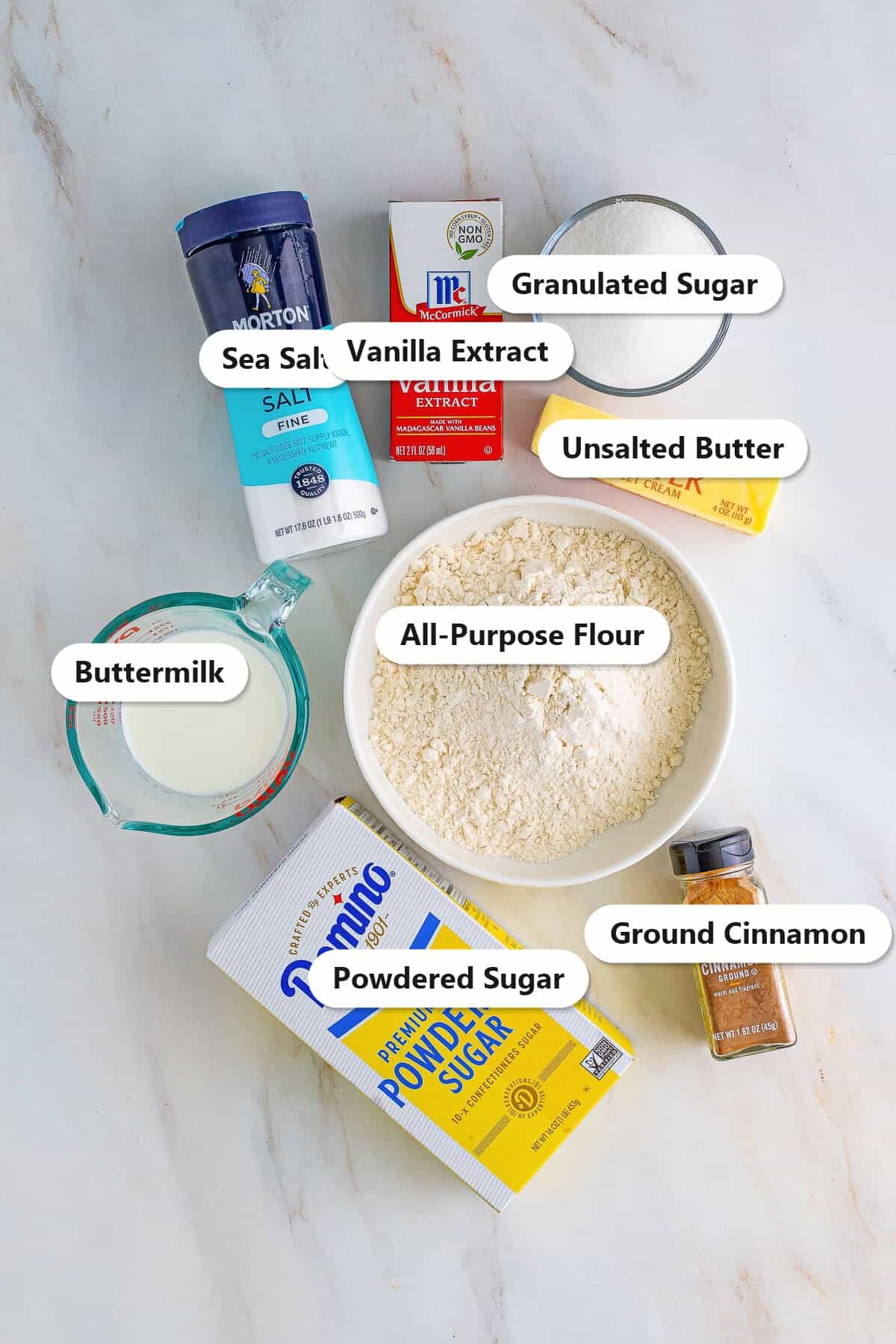 Labeled ingredients for edible Snickerdoodle Cookie Dough including flour, butter, sugar, buttermilk, vanilla, and cinnamon.