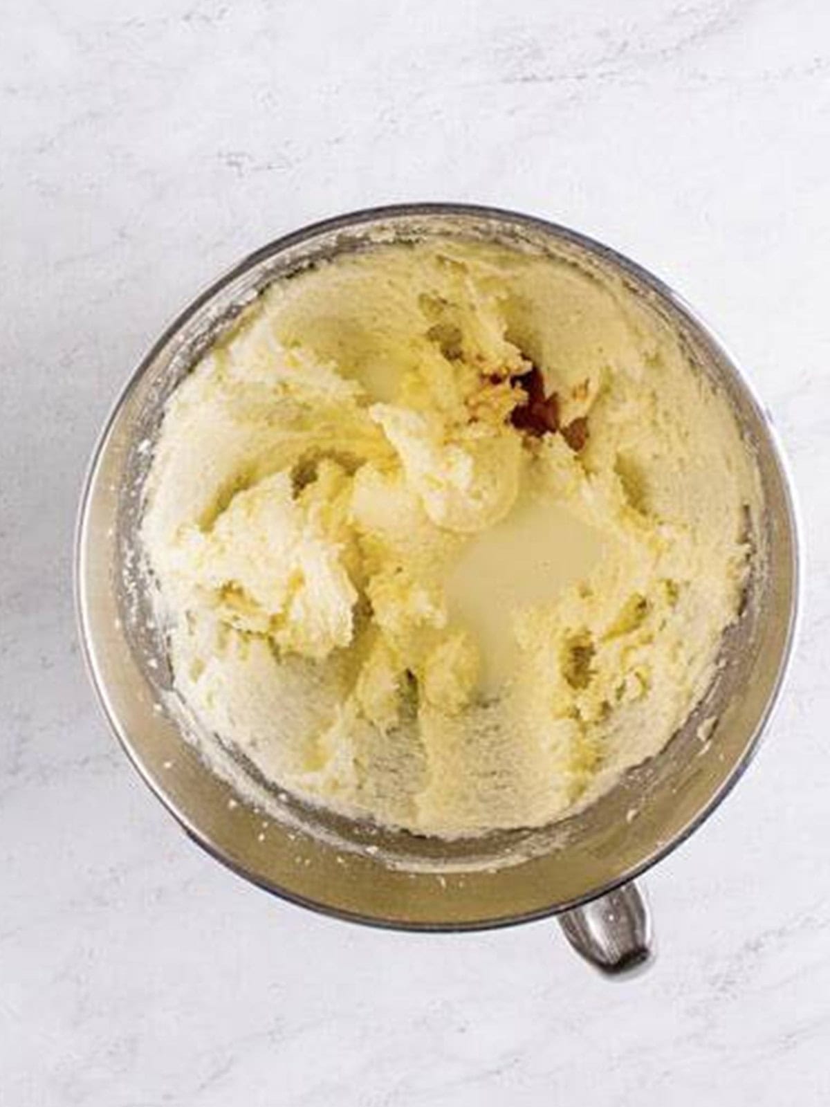 Milk, vanilla extract, and peppermint extract added to the edible sugar cookie dough base.