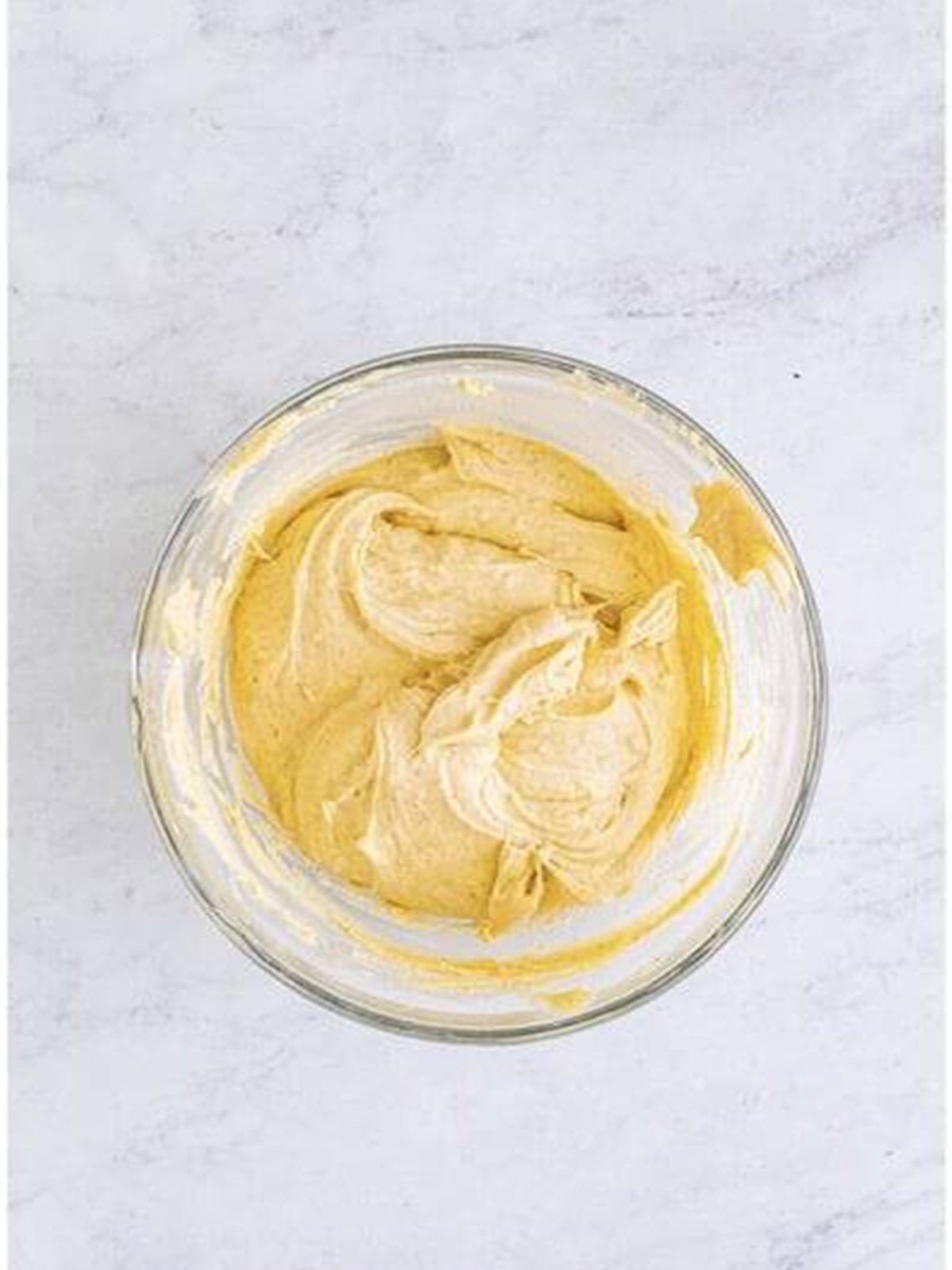 Smooth eggnog bread batter after mixing in the dry ingredients and eggnog.