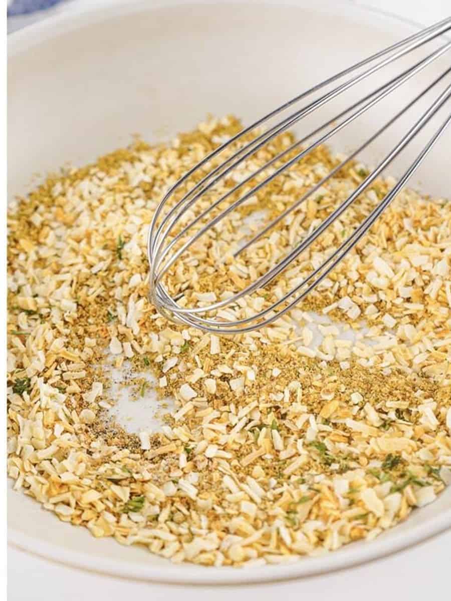 Whisking the Homemade Onion Soup Mix together until fully combined.