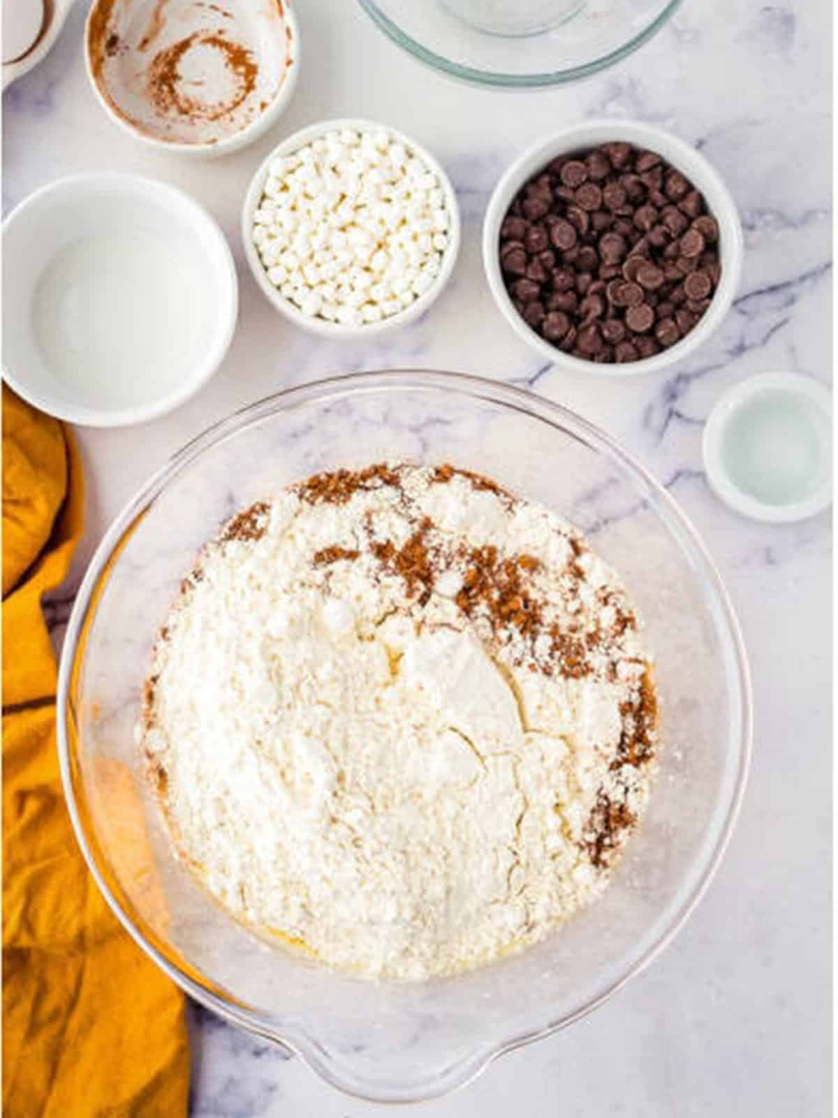 Hot chocolate mix, flour, and leavening whisked into the cake batter.