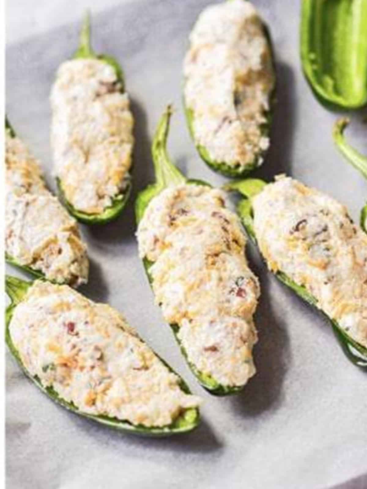 Jalapeno halves filled with the bacon cream cheese mixture.