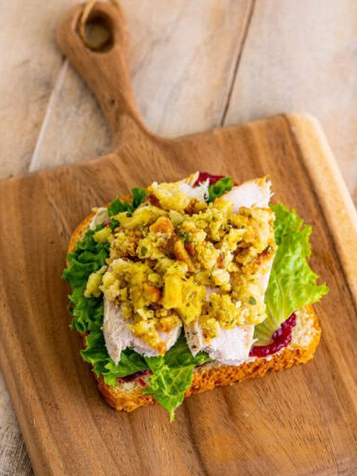 Leftover stuffing spread over the turkey layer of the leftover turkey sandwich.