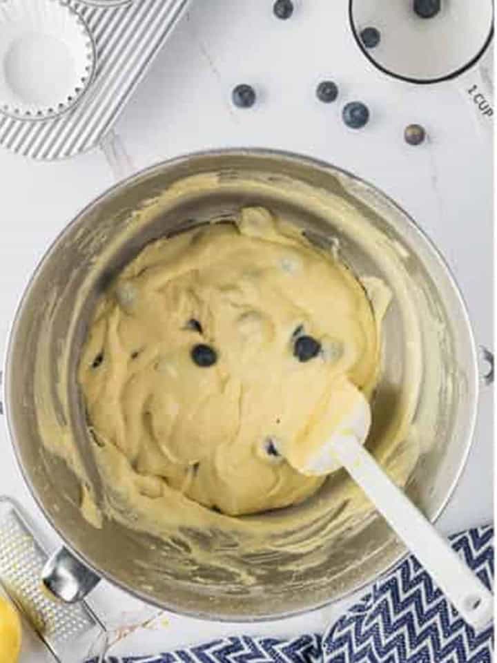 Fresh blueberries folded gently into the lemon cupcake batter.