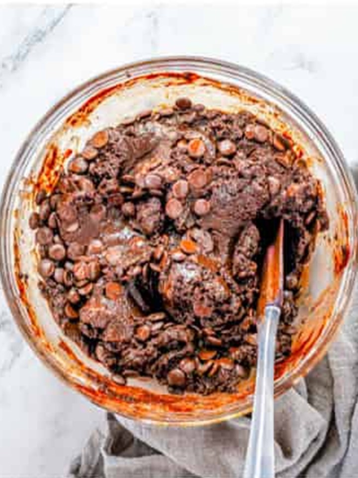 Chocolate chips folded into the thick fudgy brownie batter.