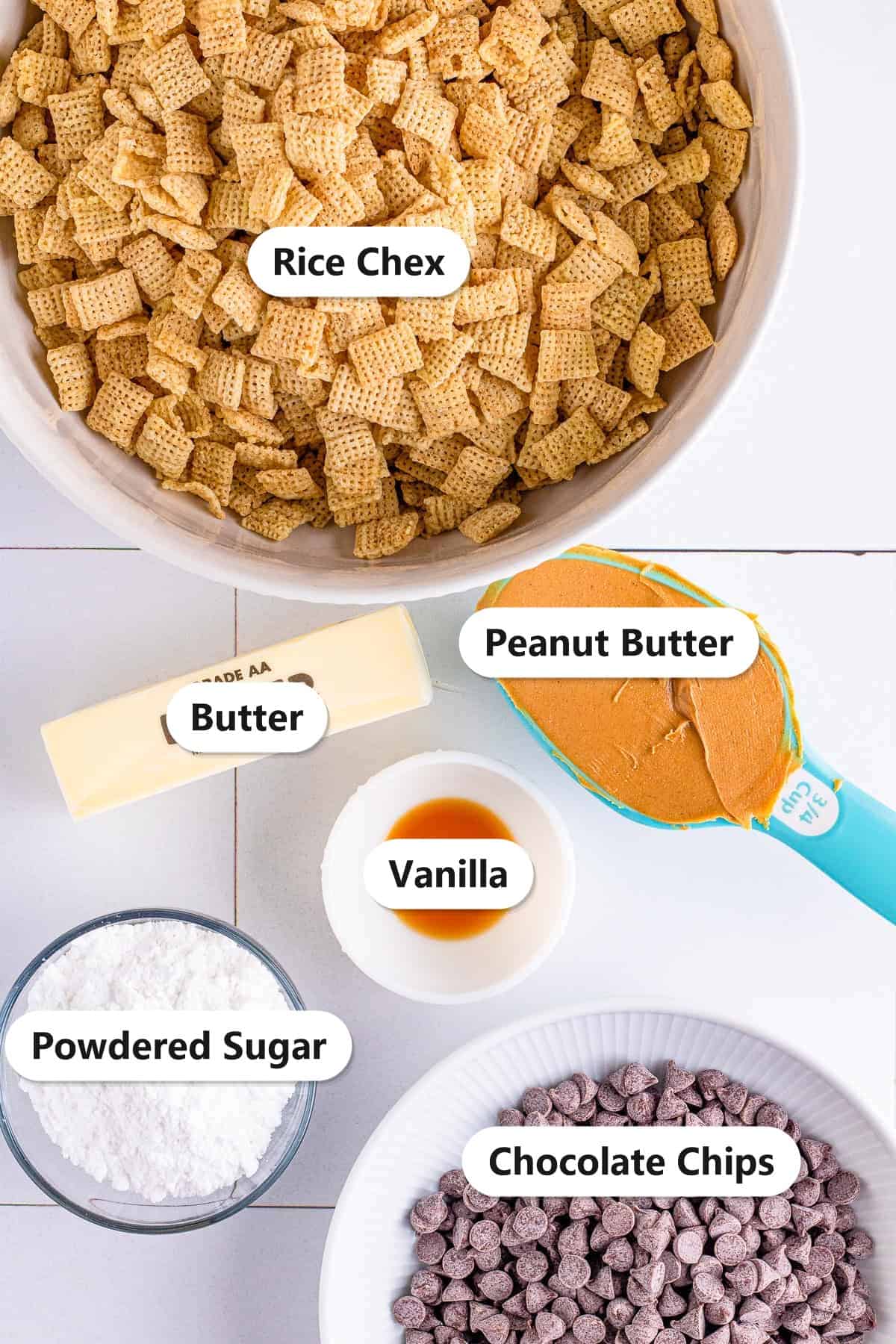 Labeled ingredients for Muddy Buddy Cookies including rice Chex, chocolate chips, peanut butter, butter, vanilla, and powdered sugar.
