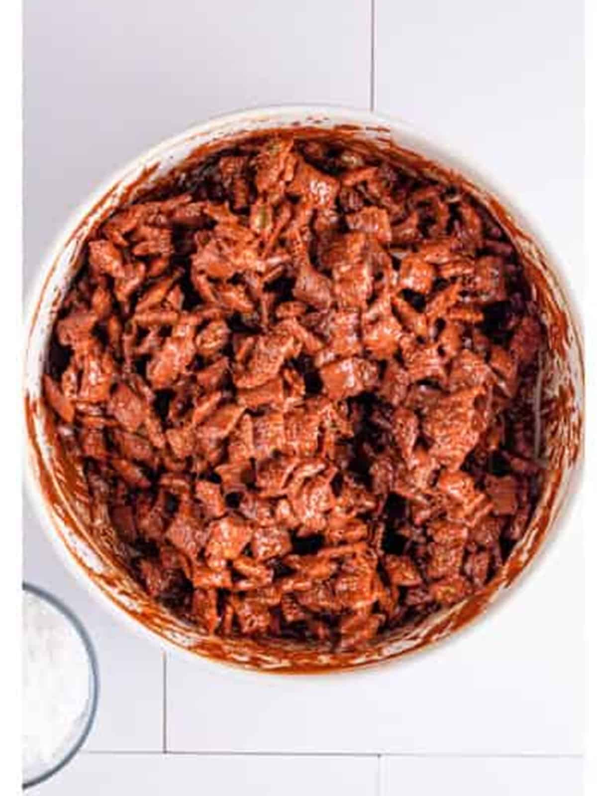 Rice Chex cereal stirred until evenly coated in the chocolate peanut butter mixture.