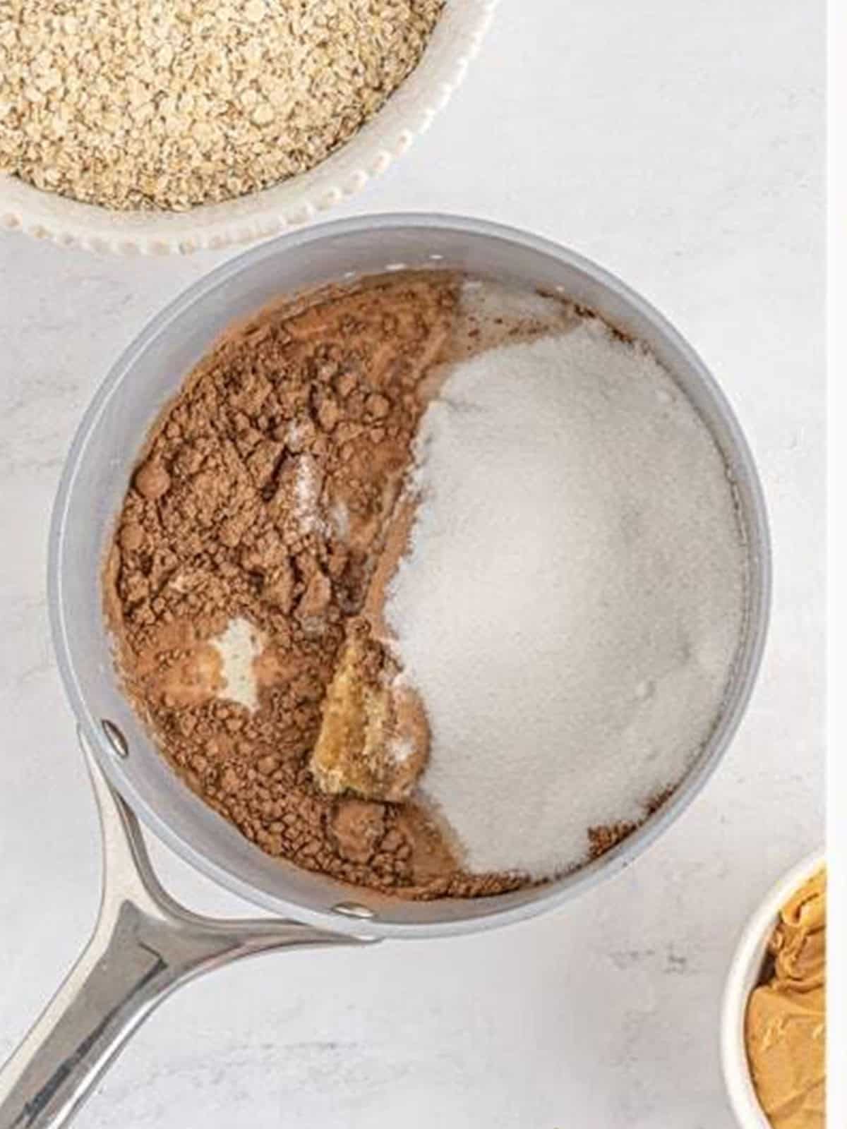 Sugar, butter, milk, cocoa, brown sugar, and salt combined in a saucepan for No Bake Cookies.