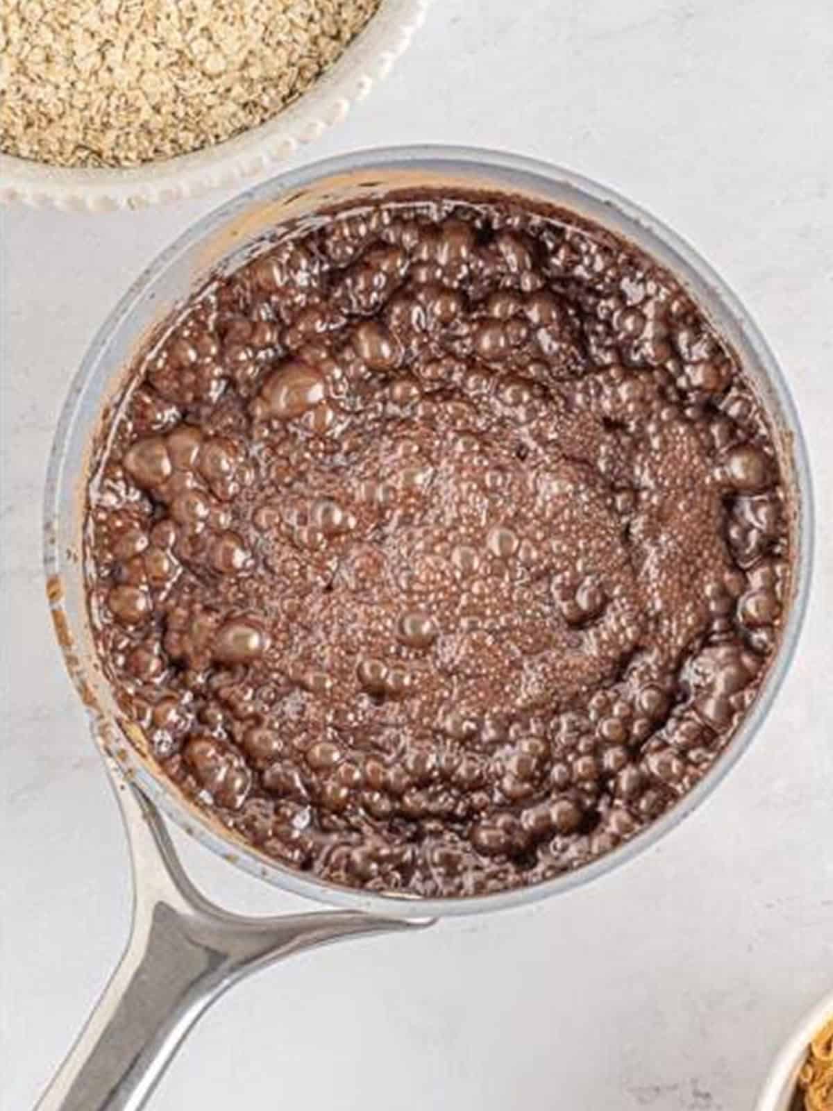 The chocolate mixture at a rolling boil for exactly one minute.