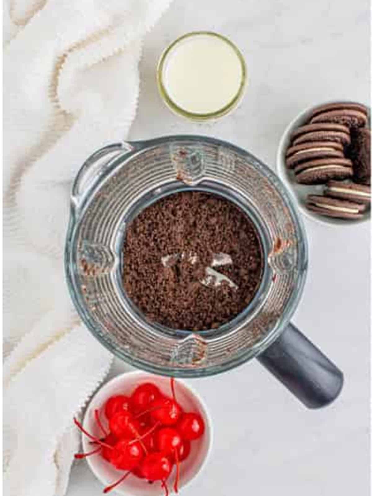 Chocolate sandwich cookies pulsed into crumbs in the blender for an Oreo Milkshake.