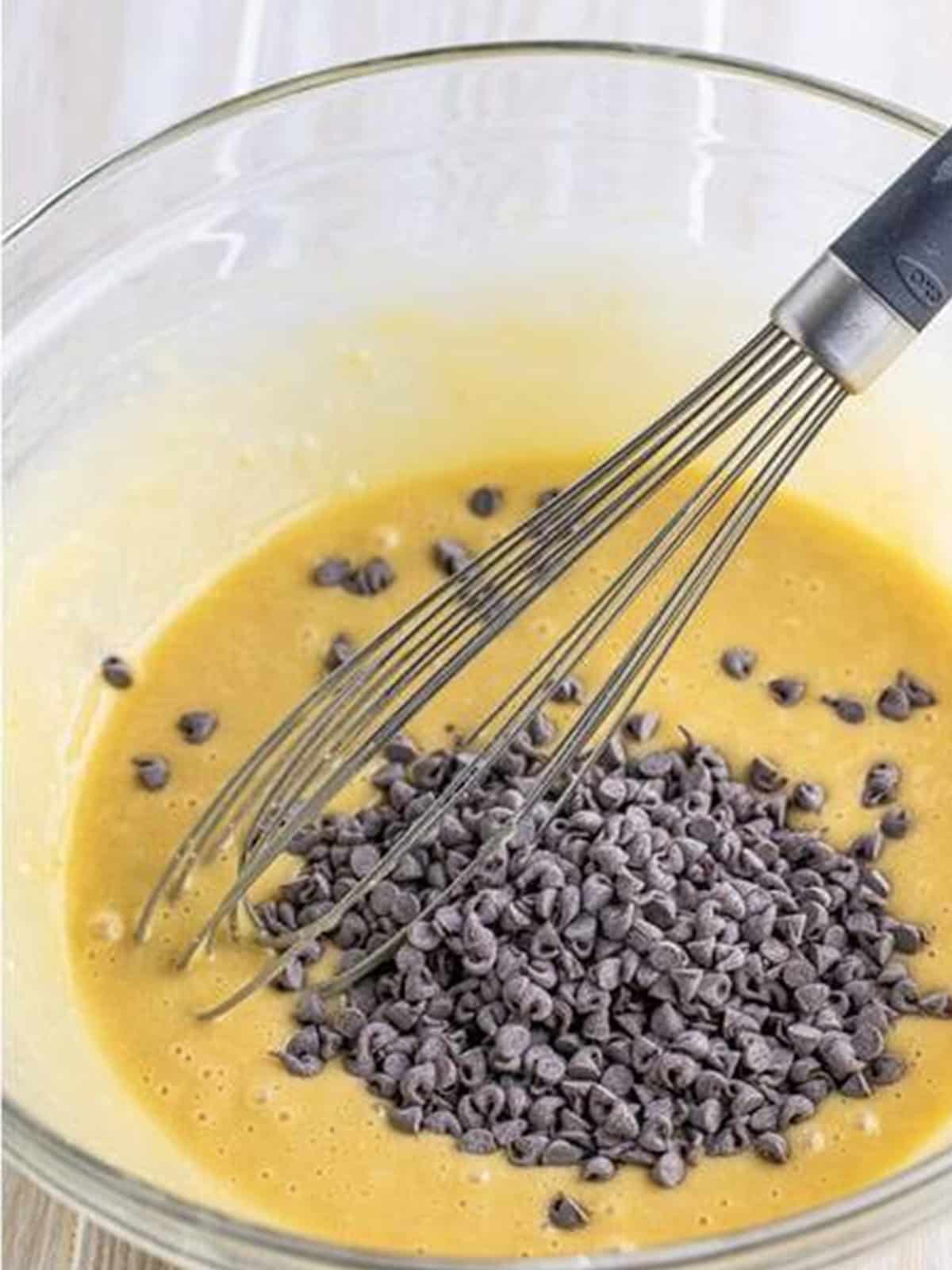 Mini chocolate chips added to the pancake cupcake batter.