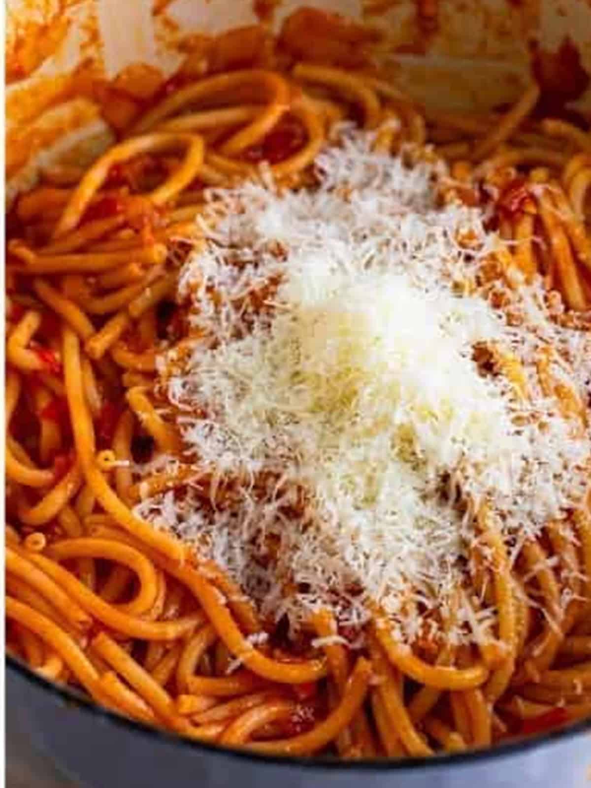 Freshly grated pecorino romano stirred into the finished Pasta Amatriciana.