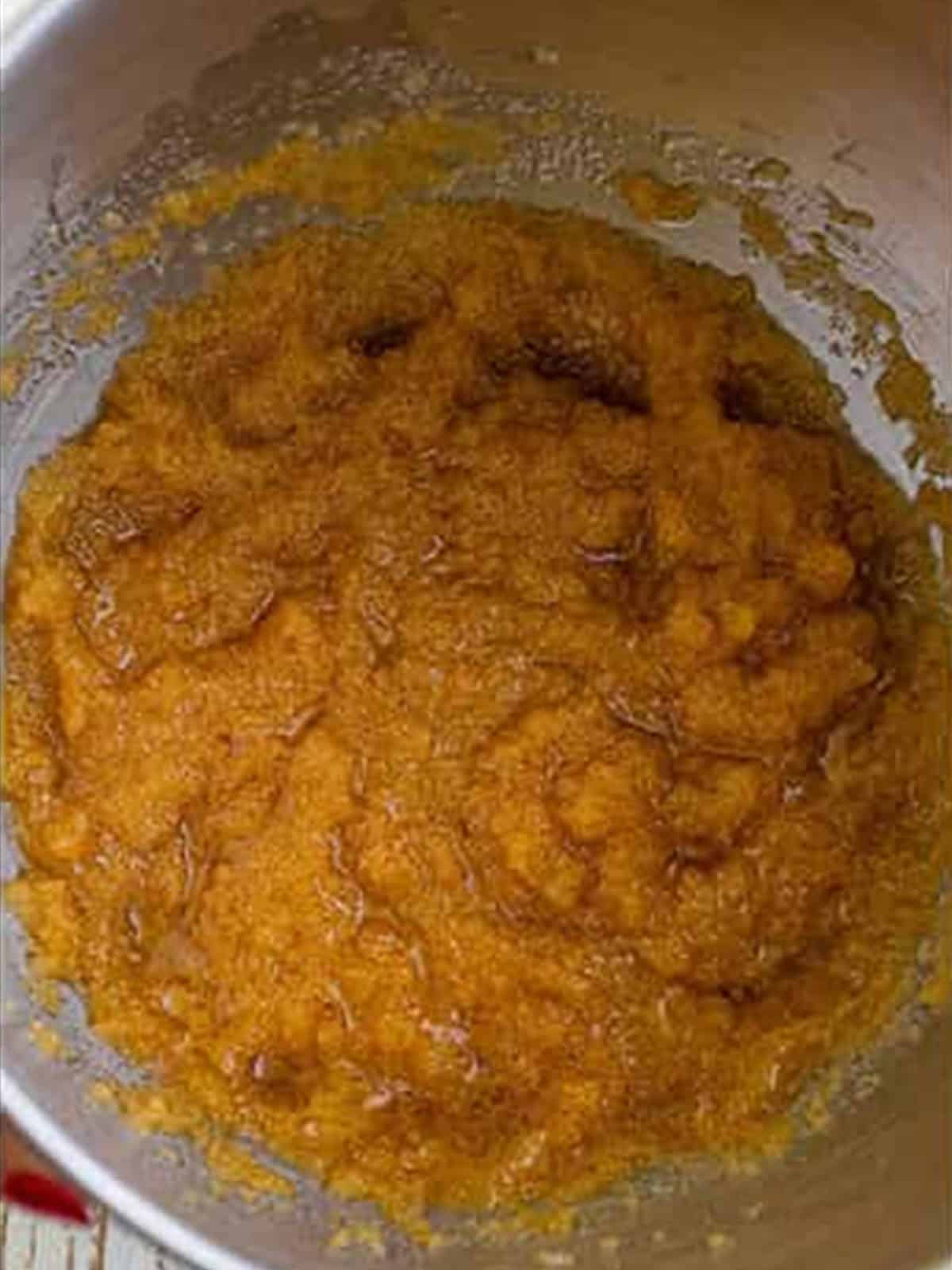 Butter, oil, granulated sugar, and brown sugar creamed together in a mixing bowl