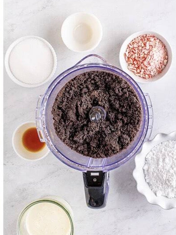 Oreo crumbs processed fine in the food processor with melted butter drizzled in for peppermint cheesecake.
